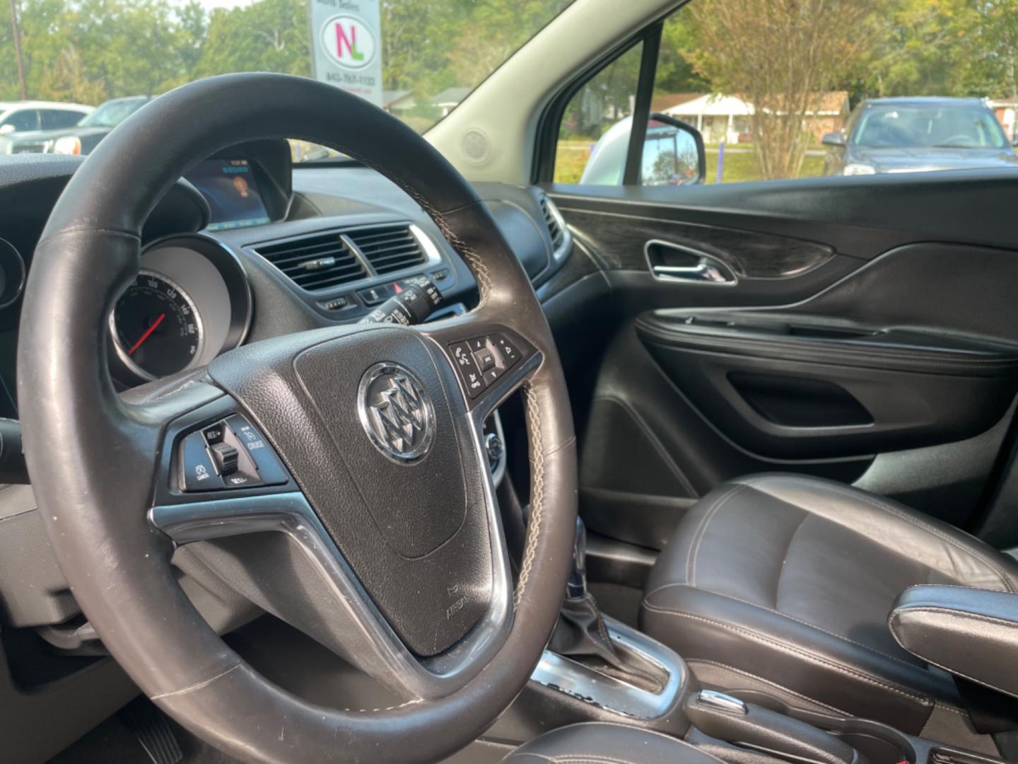 2015 SILVER BUICK ENCORE (KL4CJCSB6FB) with an 1.4L engine, Automatic transmission, located at 5103 Dorchester Rd., Charleston, SC, 29418-5607, (843) 767-1122, 36.245171, -115.228050 - Clean CarFax (no accidents reported!) Clean interior well equipped with with Leather, CD/AUX/Sat/Bluetooth, Power Everything (windows, locks, seats, mirrors), Heated/Memory Seating, Keyless Entry, Alloy Wheels. Local Trade-in!! 105k miles Located at New Life Auto Sales! 2023 WINNER for Post & Couri - Photo#21