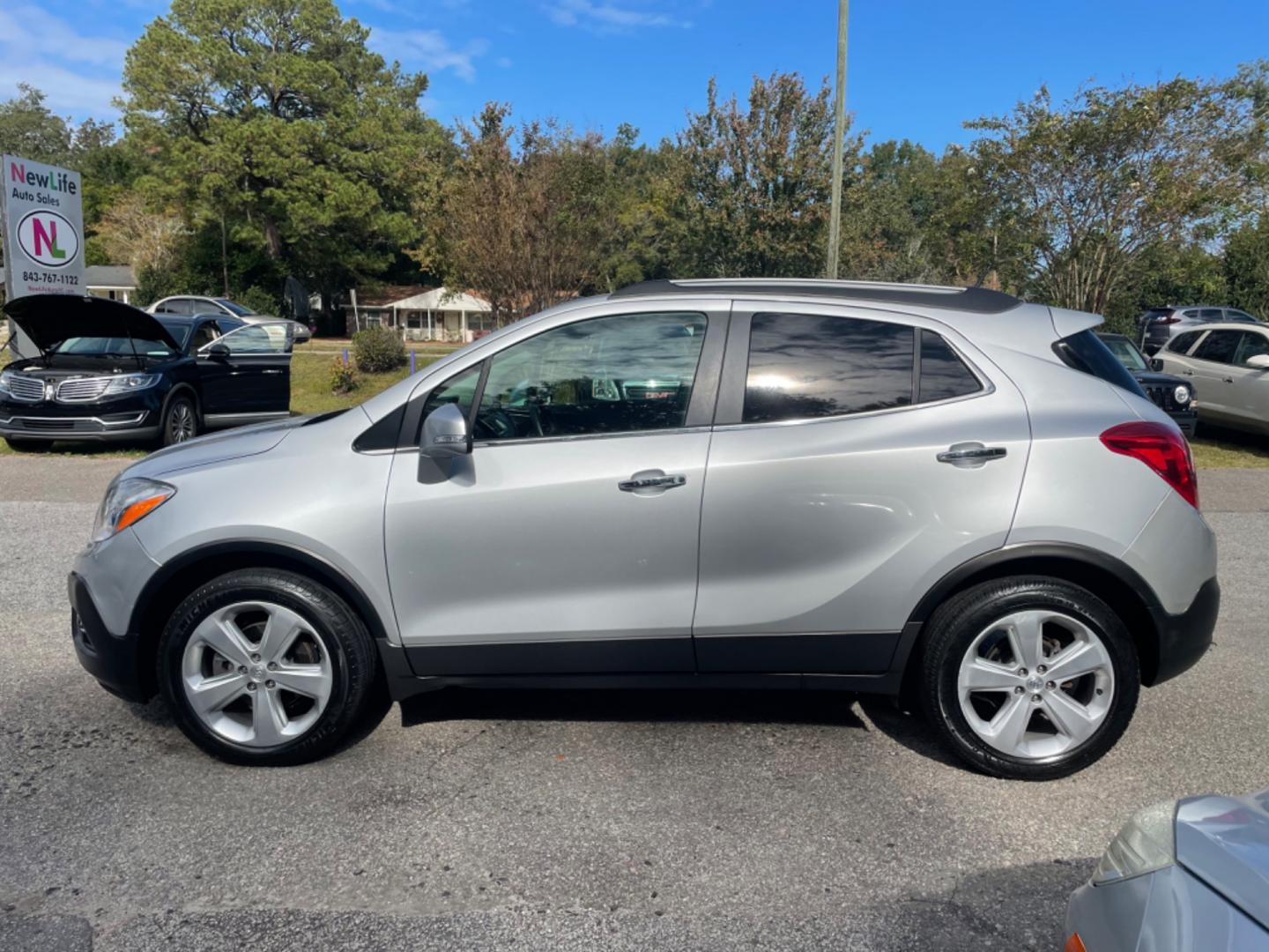 2015 SILVER BUICK ENCORE (KL4CJCSB6FB) with an 1.4L engine, Automatic transmission, located at 5103 Dorchester Rd., Charleston, SC, 29418-5607, (843) 767-1122, 36.245171, -115.228050 - Clean CarFax (no accidents reported!) Clean interior well equipped with with Leather, CD/AUX/Sat/Bluetooth, Power Everything (windows, locks, seats, mirrors), Heated/Memory Seating, Keyless Entry, Alloy Wheels. Local Trade-in!! 105k miles Located at New Life Auto Sales! 2023 WINNER for Post & Couri - Photo#2