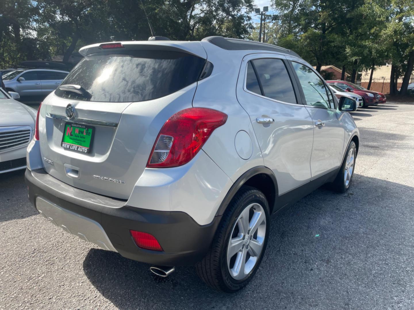 2015 SILVER BUICK ENCORE (KL4CJCSB6FB) with an 1.4L engine, Automatic transmission, located at 5103 Dorchester Rd., Charleston, SC, 29418-5607, (843) 767-1122, 36.245171, -115.228050 - Clean CarFax (no accidents reported!) Clean interior well equipped with with Leather, CD/AUX/Sat/Bluetooth, Power Everything (windows, locks, seats, mirrors), Heated/Memory Seating, Keyless Entry, Alloy Wheels. Local Trade-in!! 105k miles Located at New Life Auto Sales! 2023 WINNER for Post & Couri - Photo#4