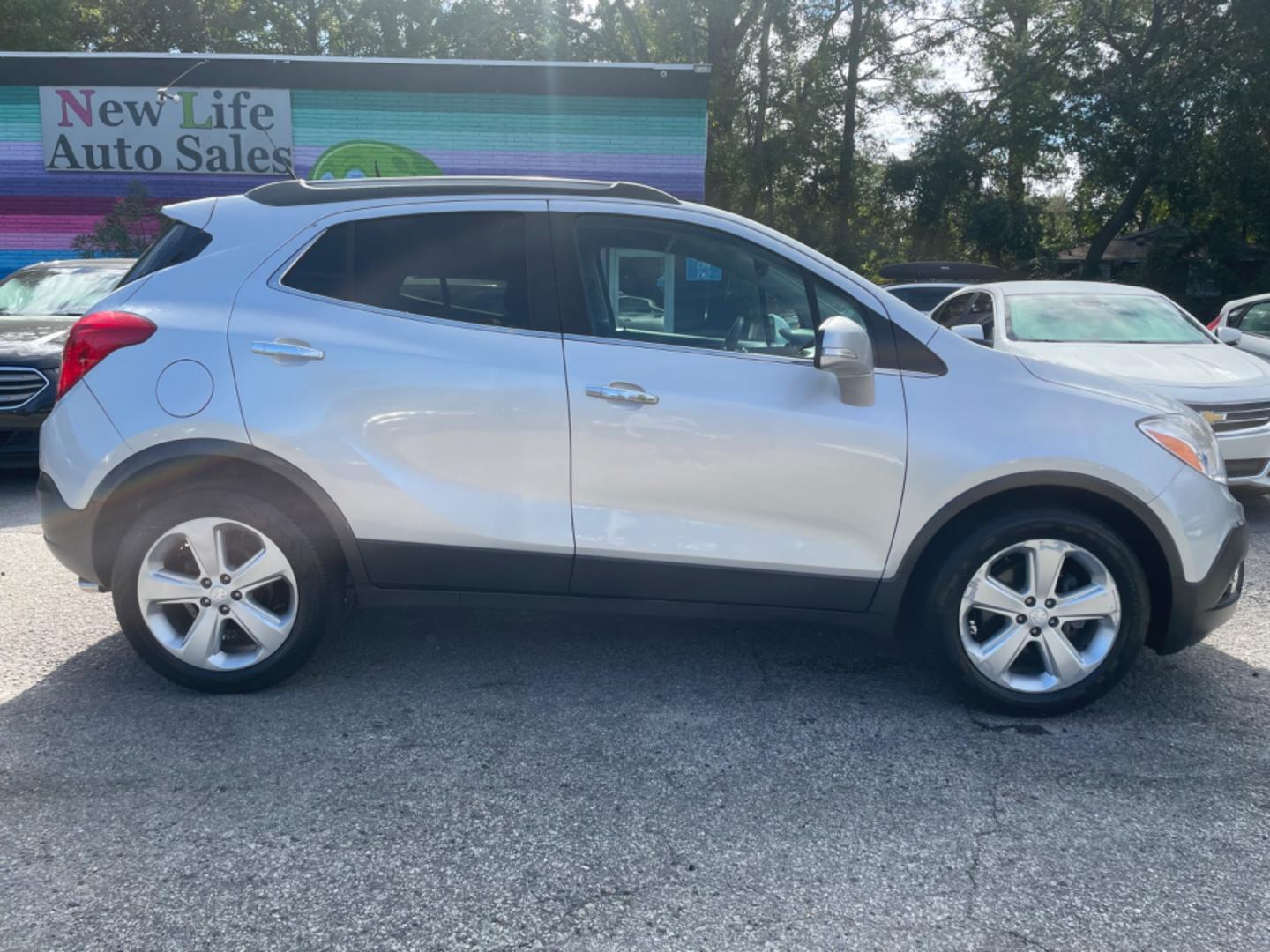 2015 SILVER BUICK ENCORE (KL4CJCSB6FB) with an 1.4L engine, Automatic transmission, located at 5103 Dorchester Rd., Charleston, SC, 29418-5607, (843) 767-1122, 36.245171, -115.228050 - Clean CarFax (no accidents reported!) Clean interior well equipped with with Leather, CD/AUX/Sat/Bluetooth, Power Everything (windows, locks, seats, mirrors), Heated/Memory Seating, Keyless Entry, Alloy Wheels. Local Trade-in!! 105k miles Located at New Life Auto Sales! 2023 WINNER for Post & Couri - Photo#5