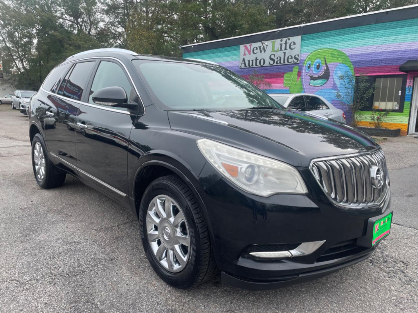 2014 BLACK BUICK ENCLAVE (5GAKRBKD4EJ) with an 3.6L engine, Automatic transmission, located at 5103 Dorchester Rd., Charleston, SC, 29418-5607, (843) 767-1122, 36.245171, -115.228050 - Leather interior with Navigation, Backup Camera, Bose Stereo with CD/AUX/Sat/Bluetooth, Dual Climate Control, Power Everything (windows, locks, seats, mirrors), Heated/Memory Seating, Rear Climate Control, Power Liftgate, 3rd Row with Middle Captains Row, Keyless Entry, Chrome Wheels. Clean CarFax ( - Photo#0