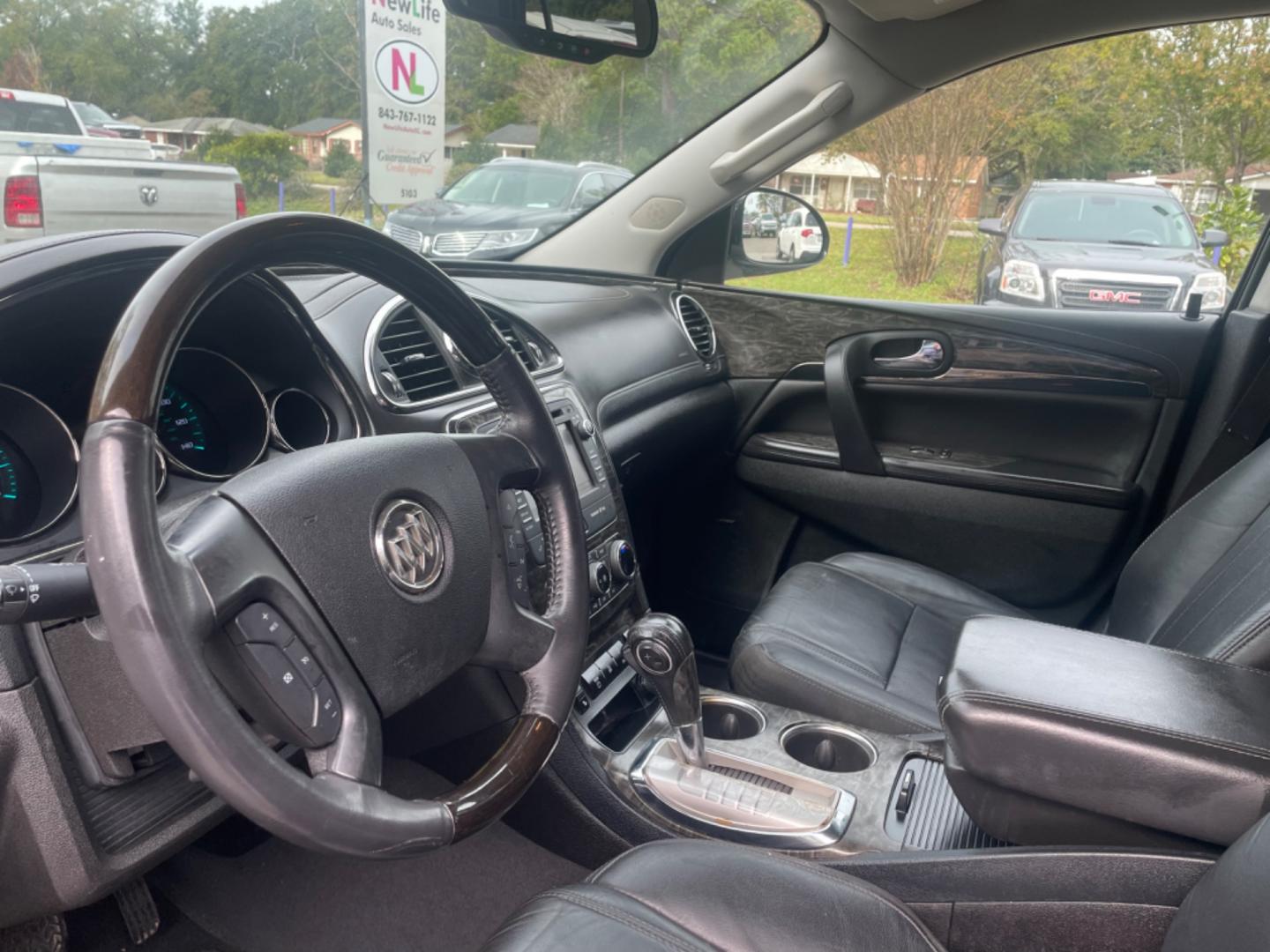 2014 BLACK BUICK ENCLAVE (5GAKRBKD4EJ) with an 3.6L engine, Automatic transmission, located at 5103 Dorchester Rd., Charleston, SC, 29418-5607, (843) 767-1122, 36.245171, -115.228050 - Leather interior with Navigation, Backup Camera, Bose Stereo with CD/AUX/Sat/Bluetooth, Dual Climate Control, Power Everything (windows, locks, seats, mirrors), Heated/Memory Seating, Rear Climate Control, Power Liftgate, 3rd Row with Middle Captains Row, Keyless Entry, Chrome Wheels. Clean CarFax ( - Photo#21