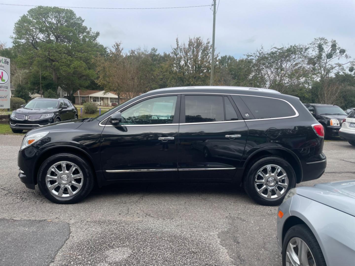 2014 BLACK BUICK ENCLAVE (5GAKRBKD4EJ) with an 3.6L engine, Automatic transmission, located at 5103 Dorchester Rd., Charleston, SC, 29418-5607, (843) 767-1122, 36.245171, -115.228050 - Leather interior with Navigation, Backup Camera, Bose Stereo with CD/AUX/Sat/Bluetooth, Dual Climate Control, Power Everything (windows, locks, seats, mirrors), Heated/Memory Seating, Rear Climate Control, Power Liftgate, 3rd Row with Middle Captains Row, Keyless Entry, Chrome Wheels. Clean CarFax ( - Photo#3