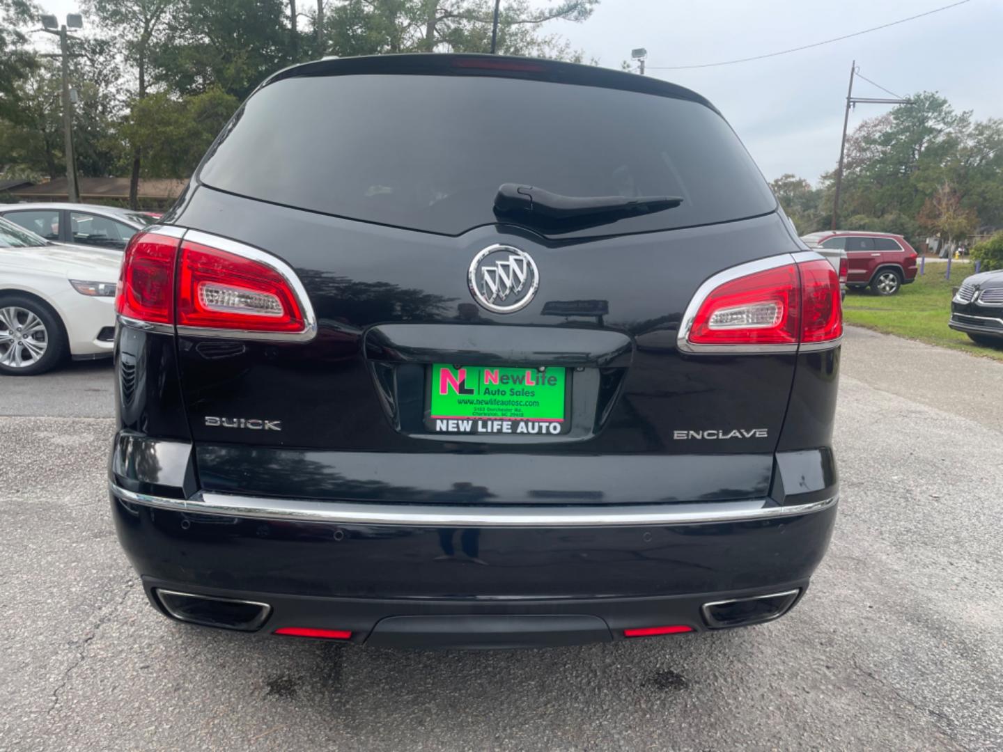 2014 BLACK BUICK ENCLAVE (5GAKRBKD4EJ) with an 3.6L engine, Automatic transmission, located at 5103 Dorchester Rd., Charleston, SC, 29418-5607, (843) 767-1122, 36.245171, -115.228050 - Leather interior with Navigation, Backup Camera, Bose Stereo with CD/AUX/Sat/Bluetooth, Dual Climate Control, Power Everything (windows, locks, seats, mirrors), Heated/Memory Seating, Rear Climate Control, Power Liftgate, 3rd Row with Middle Captains Row, Keyless Entry, Chrome Wheels. Clean CarFax ( - Photo#5