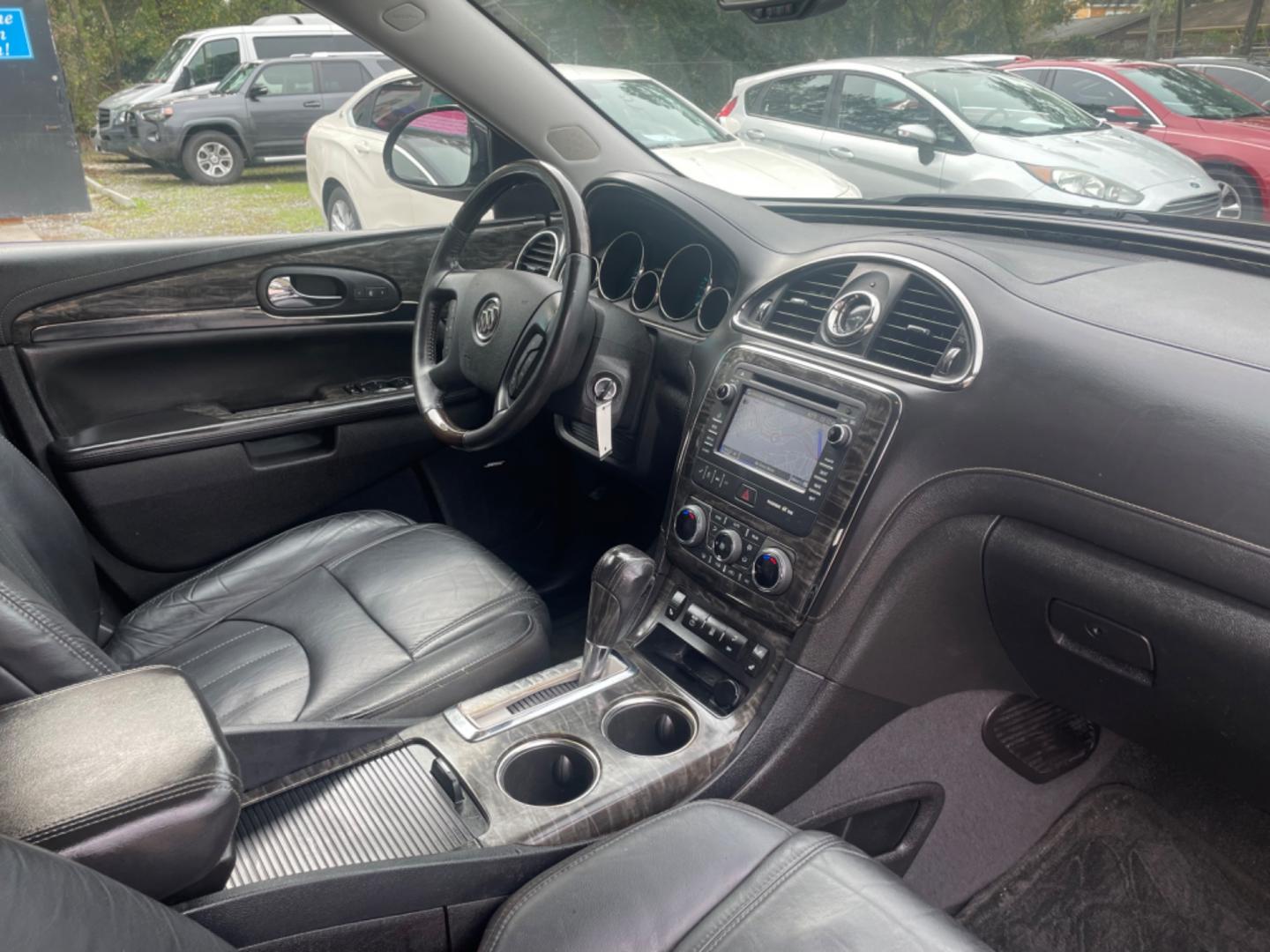 2014 BLACK BUICK ENCLAVE (5GAKRBKD4EJ) with an 3.6L engine, Automatic transmission, located at 5103 Dorchester Rd., Charleston, SC, 29418-5607, (843) 767-1122, 36.245171, -115.228050 - Leather interior with Navigation, Backup Camera, Bose Stereo with CD/AUX/Sat/Bluetooth, Dual Climate Control, Power Everything (windows, locks, seats, mirrors), Heated/Memory Seating, Rear Climate Control, Power Liftgate, 3rd Row with Middle Captains Row, Keyless Entry, Chrome Wheels. Clean CarFax ( - Photo#8