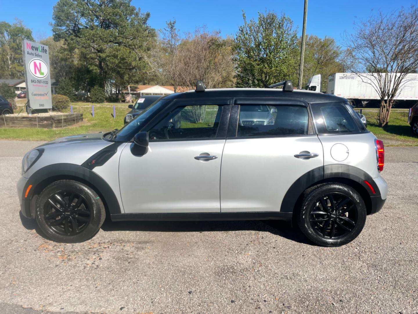 2013 GRAY MINI COOPER COUNTRYMAN (WMWZB3C54DW) with an 1.6L engine, Automatic transmission, located at 5103 Dorchester Rd., Charleston, SC, 29418-5607, (843) 767-1122, 36.245171, -115.228050 - Photo#3