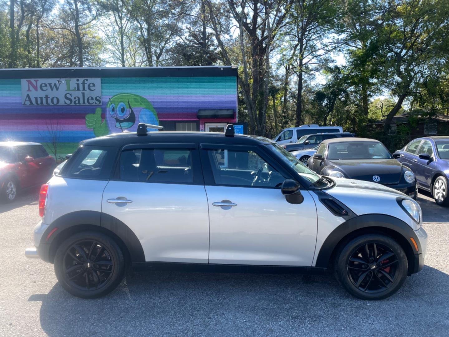 2013 GRAY MINI COOPER COUNTRYMAN (WMWZB3C54DW) with an 1.6L engine, Automatic transmission, located at 5103 Dorchester Rd., Charleston, SC, 29418-5607, (843) 767-1122, 36.245171, -115.228050 - Photo#7