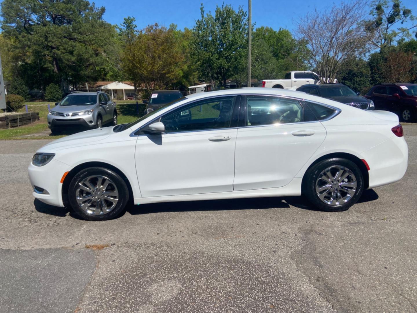 2016 WHITE CHRYSLER 200 LIMITED (1C3CCCAB1GN) with an 2.4L engine, Automatic transmission, located at 5103 Dorchester Rd., Charleston, SC, 29418-5607, (843) 767-1122, 36.245171, -115.228050 - Photo#2