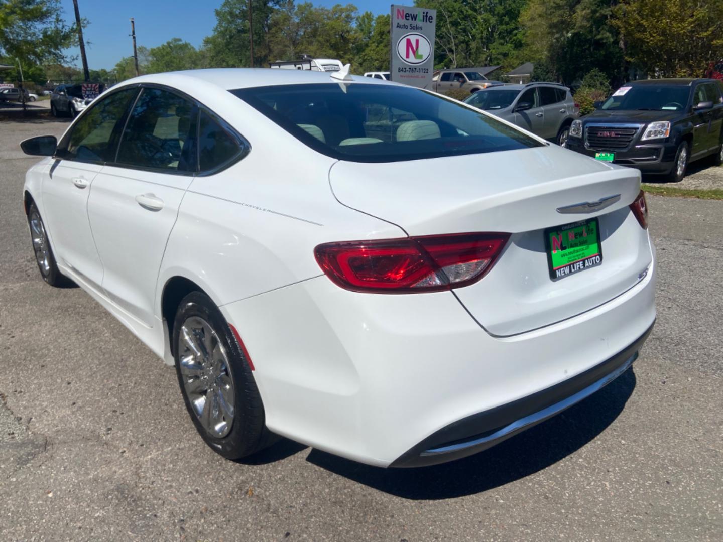 2016 WHITE CHRYSLER 200 LIMITED (1C3CCCAB1GN) with an 2.4L engine, Automatic transmission, located at 5103 Dorchester Rd., Charleston, SC, 29418-5607, (843) 767-1122, 36.245171, -115.228050 - Photo#3