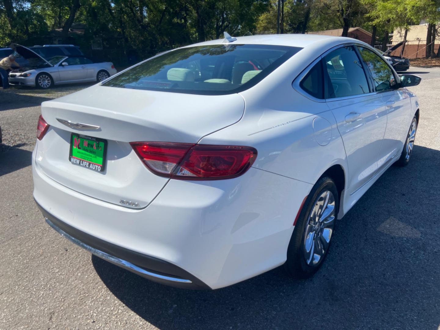 2016 WHITE CHRYSLER 200 LIMITED (1C3CCCAB1GN) with an 2.4L engine, Automatic transmission, located at 5103 Dorchester Rd., Charleston, SC, 29418-5607, (843) 767-1122, 36.245171, -115.228050 - Photo#5