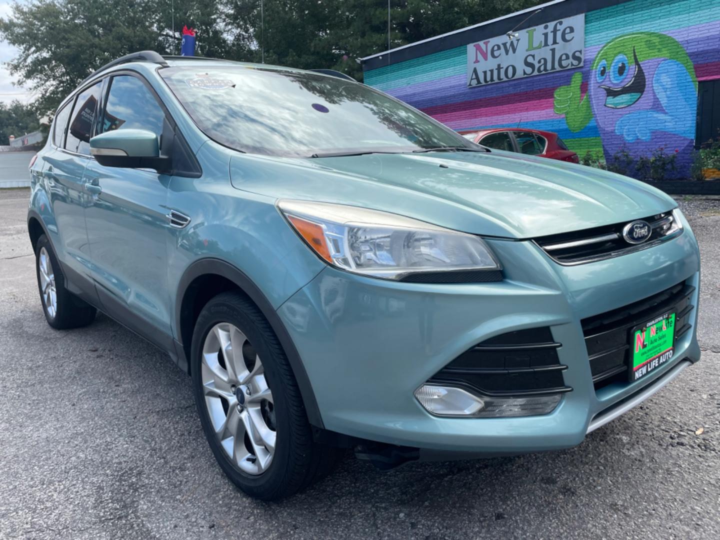 2013 BLUE FORD ESCAPE SEL (1FMCU9HX0DU) with an 1.6L engine, Automatic transmission, located at 5103 Dorchester Rd., Charleston, SC, 29418-5607, (843) 767-1122, 36.245171, -115.228050 - Clean CarFax (no accidents reported!) Clean interior with Leather, CD/USB/Sat/Bluetooth, Power Everything (windows, locks, seat, mirrors), Power Liftgate, Heated/Memory Seating, Push Button Start, Keyless Entry, Alloy Wheels. Certified One Owner!! Only 109k miles! Located at New Life Auto Sales! 2 - Photo#0