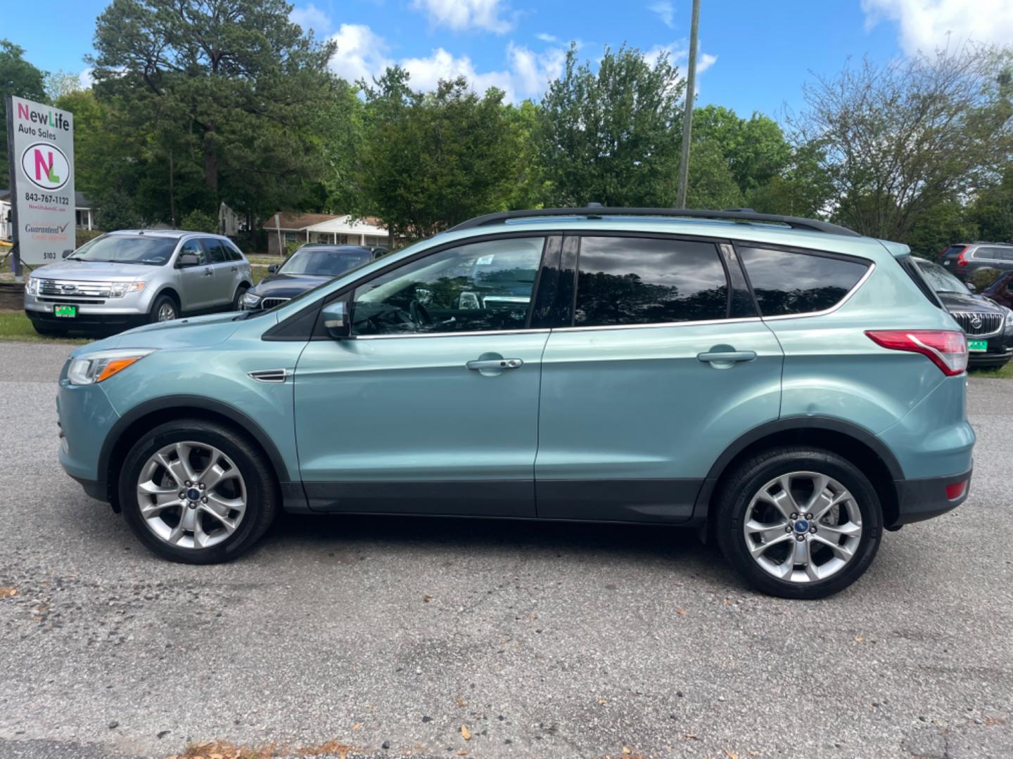 2013 BLUE FORD ESCAPE SEL (1FMCU9HX0DU) with an 1.6L engine, Automatic transmission, located at 5103 Dorchester Rd., Charleston, SC, 29418-5607, (843) 767-1122, 36.245171, -115.228050 - Clean CarFax (no accidents reported!) Clean interior with Leather, CD/USB/Sat/Bluetooth, Power Everything (windows, locks, seat, mirrors), Power Liftgate, Heated/Memory Seating, Push Button Start, Keyless Entry, Alloy Wheels. Certified One Owner!! Only 109k miles! Located at New Life Auto Sales! 2 - Photo#2