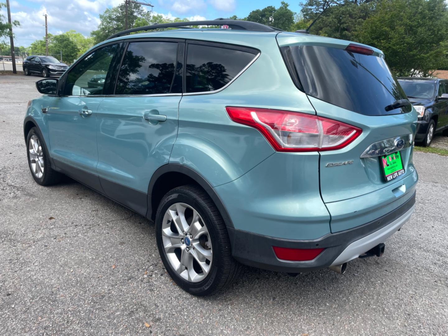 2013 BLUE FORD ESCAPE SEL (1FMCU9HX0DU) with an 1.6L engine, Automatic transmission, located at 5103 Dorchester Rd., Charleston, SC, 29418-5607, (843) 767-1122, 36.245171, -115.228050 - Clean CarFax (no accidents reported!) Clean interior with Leather, CD/USB/Sat/Bluetooth, Power Everything (windows, locks, seat, mirrors), Power Liftgate, Heated/Memory Seating, Push Button Start, Keyless Entry, Alloy Wheels. Certified One Owner!! Only 109k miles! Located at New Life Auto Sales! 2 - Photo#4