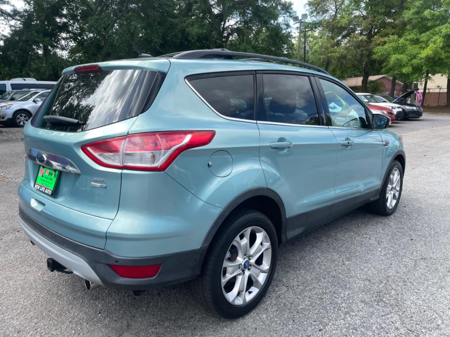 2013 BLUE FORD ESCAPE SEL (1FMCU9HX0DU) with an 1.6L engine, Automatic transmission, located at 5103 Dorchester Rd., Charleston, SC, 29418-5607, (843) 767-1122, 36.245171, -115.228050 - Clean CarFax (no accidents reported!) Clean interior with Leather, CD/USB/Sat/Bluetooth, Power Everything (windows, locks, seat, mirrors), Power Liftgate, Heated/Memory Seating, Push Button Start, Keyless Entry, Alloy Wheels. Certified One Owner!! Only 109k miles! Located at New Life Auto Sales! 2 - Photo#5