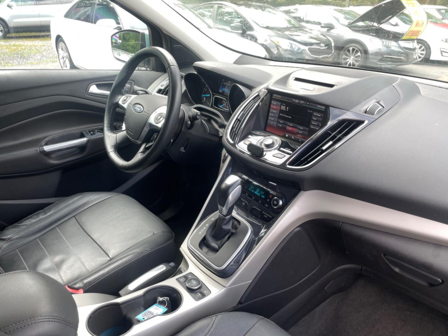 2013 BLUE FORD ESCAPE SEL (1FMCU9HX0DU) with an 1.6L engine, Automatic transmission, located at 5103 Dorchester Rd., Charleston, SC, 29418-5607, (843) 767-1122, 36.245171, -115.228050 - Clean CarFax (no accidents reported!) Clean interior with Leather, CD/USB/Sat/Bluetooth, Power Everything (windows, locks, seat, mirrors), Power Liftgate, Heated/Memory Seating, Push Button Start, Keyless Entry, Alloy Wheels. Certified One Owner!! Only 109k miles! Located at New Life Auto Sales! 2 - Photo#7