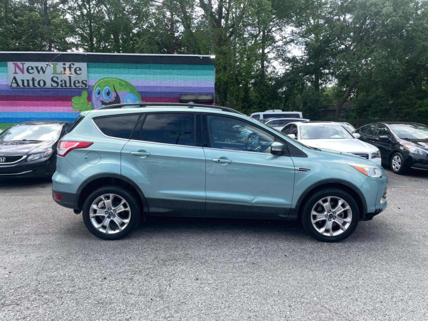 2013 BLUE FORD ESCAPE SEL (1FMCU9HX0DU) with an 1.6L engine, Automatic transmission, located at 5103 Dorchester Rd., Charleston, SC, 29418-5607, (843) 767-1122, 36.245171, -115.228050 - Clean CarFax (no accidents reported!) Clean interior with Leather, CD/USB/Sat/Bluetooth, Power Everything (windows, locks, seat, mirrors), Power Liftgate, Heated/Memory Seating, Push Button Start, Keyless Entry, Alloy Wheels. Certified One Owner!! Only 109k miles! Located at New Life Auto Sales! 2 - Photo#6