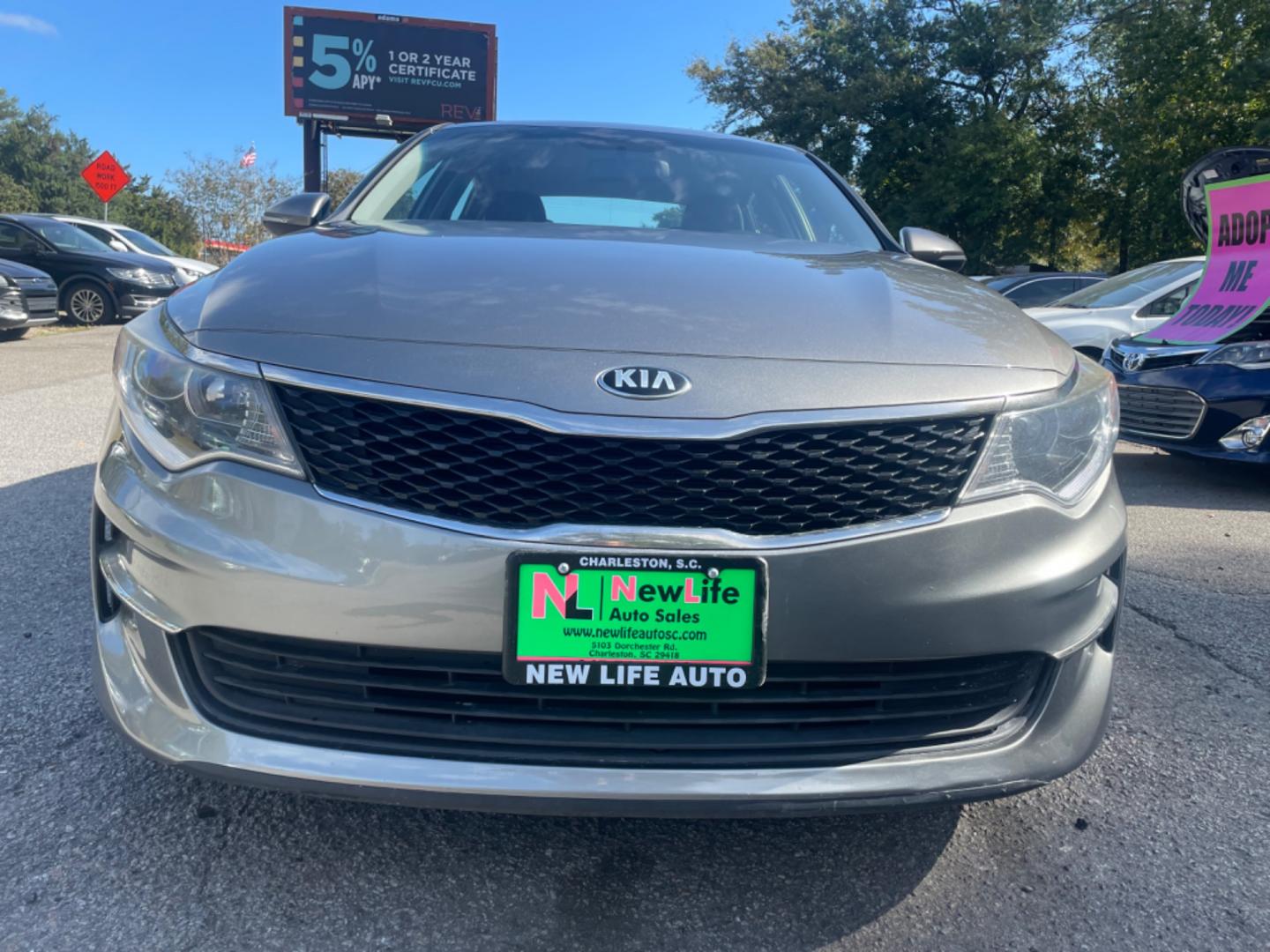 2016 GRAY KIA OPTIMA LX (5XXGT4L32GG) with an 2.4L engine, Automatic transmission, located at 5103 Dorchester Rd., Charleston, SC, 29418-5607, (843) 767-1122, 36.245171, -115.228050 - Photo#1