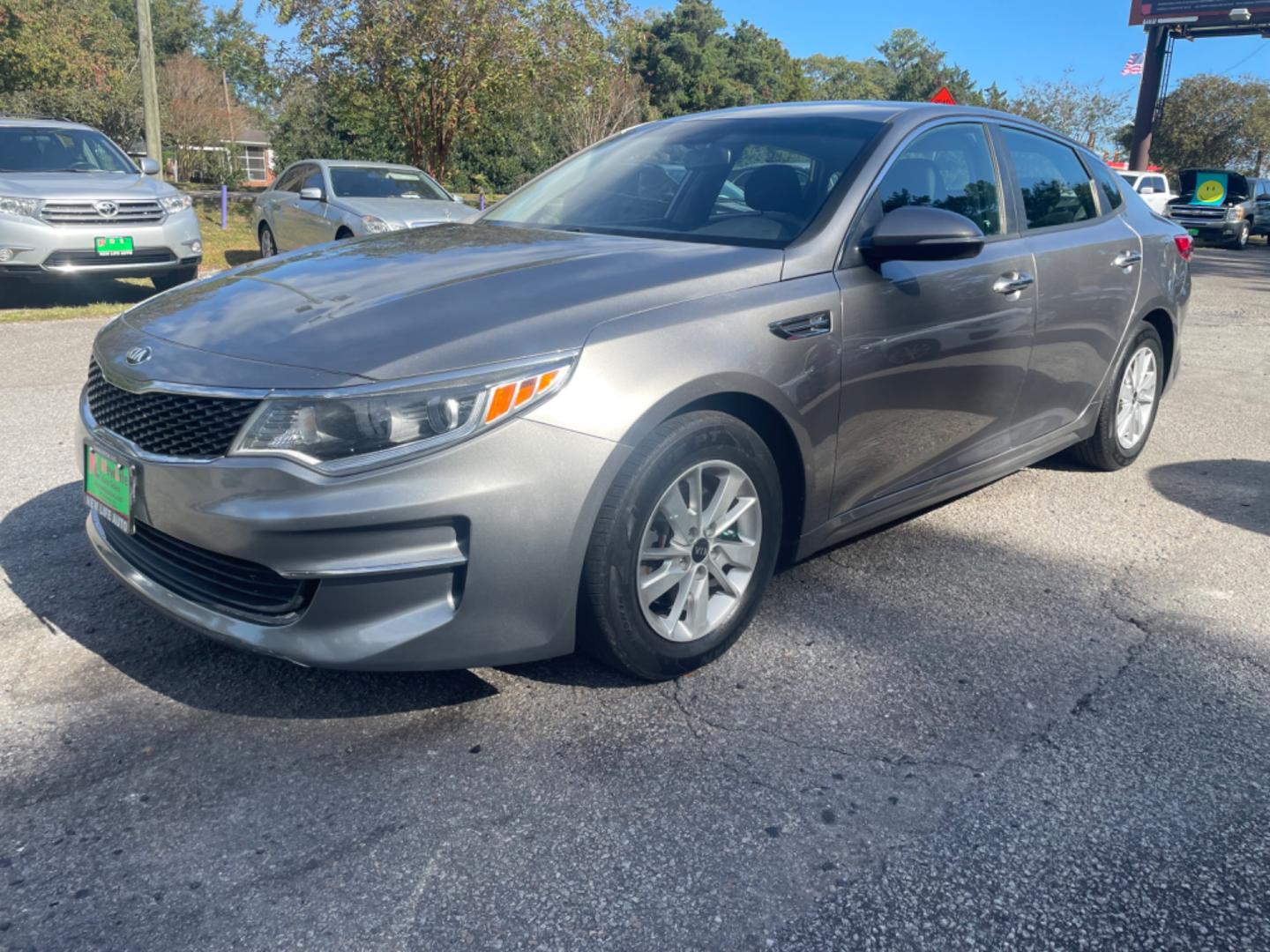 2016 GRAY KIA OPTIMA LX (5XXGT4L32GG) with an 2.4L engine, Automatic transmission, located at 5103 Dorchester Rd., Charleston, SC, 29418-5607, (843) 767-1122, 36.245171, -115.228050 - Photo#2