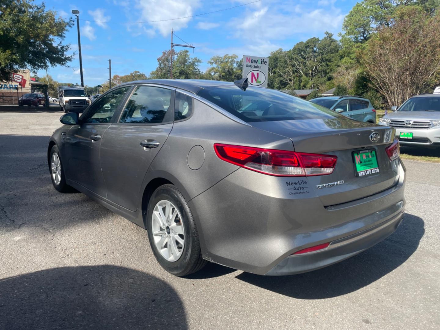 2016 GRAY KIA OPTIMA LX (5XXGT4L32GG) with an 2.4L engine, Automatic transmission, located at 5103 Dorchester Rd., Charleston, SC, 29418-5607, (843) 767-1122, 36.245171, -115.228050 - Photo#4