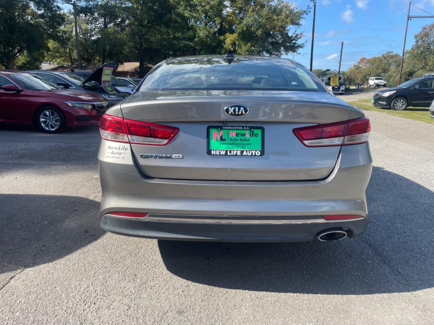 2016 GRAY KIA OPTIMA LX (5XXGT4L32GG) with an 2.4L engine, Automatic transmission, located at 5103 Dorchester Rd., Charleston, SC, 29418-5607, (843) 767-1122, 36.245171, -115.228050 - Photo#5