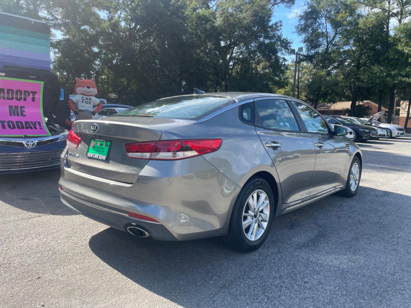 2016 GRAY KIA OPTIMA LX (5XXGT4L32GG) with an 2.4L engine, Automatic transmission, located at 5103 Dorchester Rd., Charleston, SC, 29418-5607, (843) 767-1122, 36.245171, -115.228050 - Photo#6