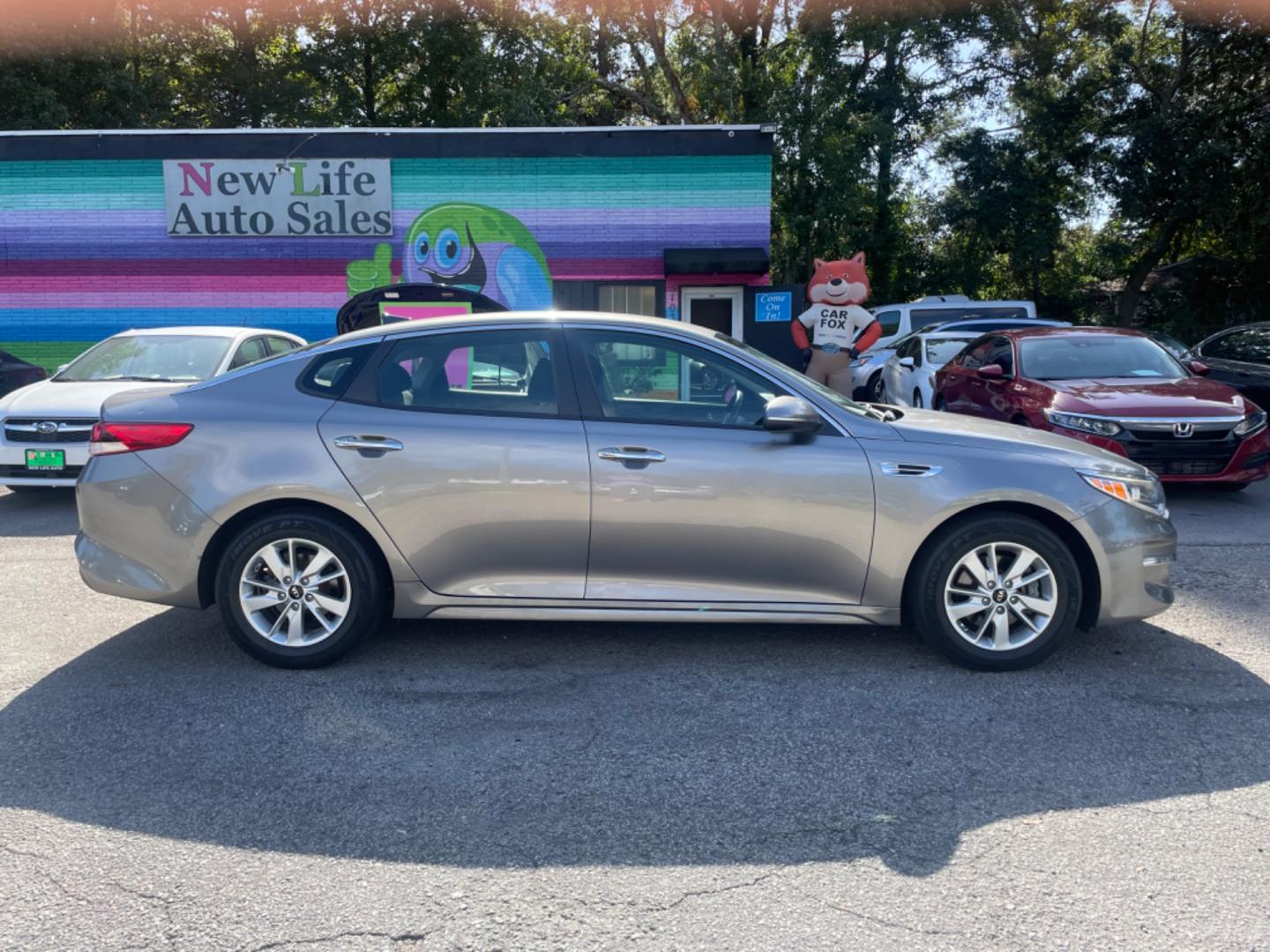 2016 GRAY KIA OPTIMA LX (5XXGT4L32GG) with an 2.4L engine, Automatic transmission, located at 5103 Dorchester Rd., Charleston, SC, 29418-5607, (843) 767-1122, 36.245171, -115.228050 - Photo#7