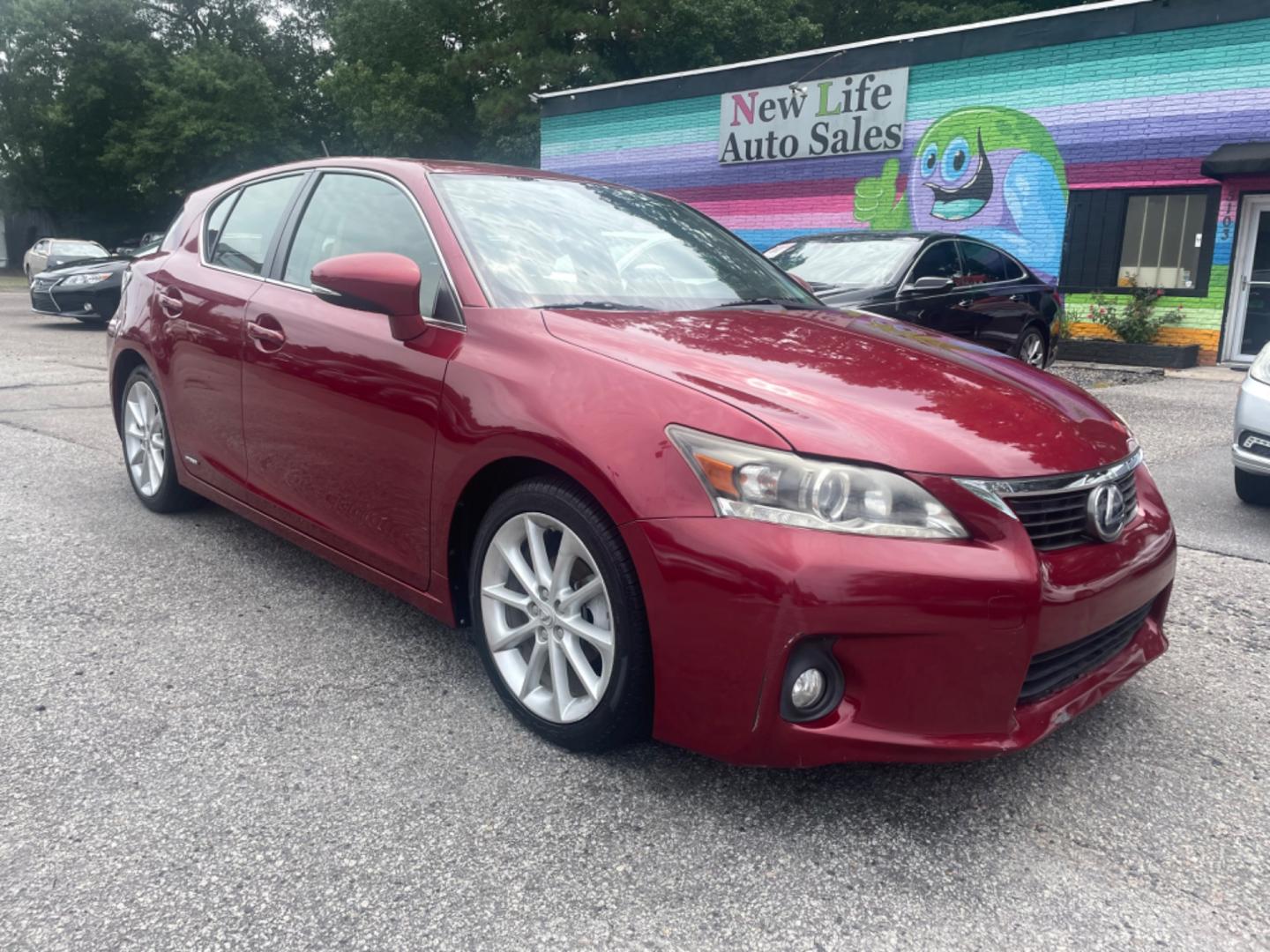 2013 RED LEXUS CT 200 (JTHKD5BH3D2) with an 1.8L engine, Automatic transmission, located at 5103 Dorchester Rd., Charleston, SC, 29418-5607, (843) 767-1122, 36.245171, -115.228050 - Photo#0