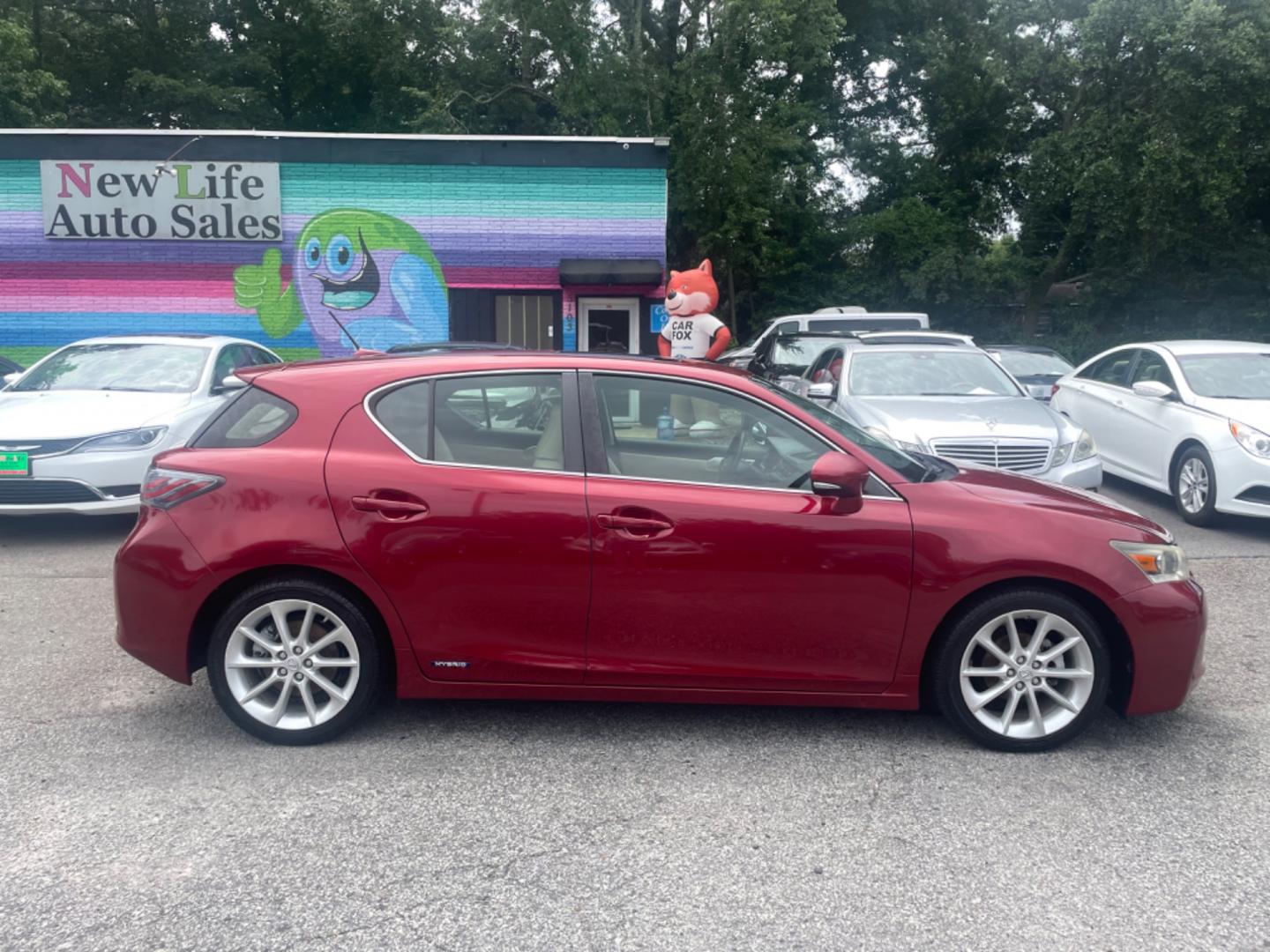 2013 RED LEXUS CT 200 (JTHKD5BH3D2) with an 1.8L engine, Automatic transmission, located at 5103 Dorchester Rd., Charleston, SC, 29418-5607, (843) 767-1122, 36.245171, -115.228050 - Local Trade-in with Leather, Sunroof, CD/AUX/Sat/Bluetooth, Navigation, Backup Camera, Dual Climate Control, Power Everything (locks, seats, mirrors), Heated Seats, Push Button Start, Keyless Entry, Alloy Wheels. Only 106k miles! Located at New Life Auto Sales! 2023 WINNER for Post & Courier's Char - Photo#6