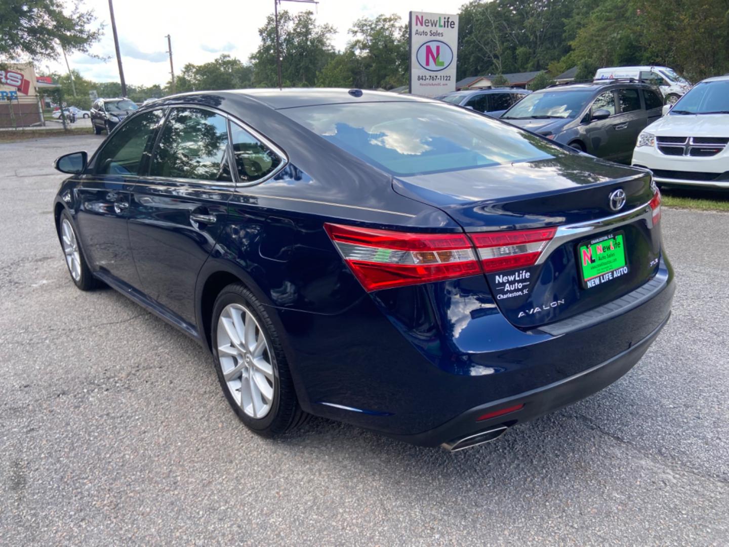 2013 BLUE TOYOTA AVALON BASE (4T1BK1EB3DU) with an 3.5L engine, Automatic transmission, located at 5103 Dorchester Rd., Charleston, SC, 29418-5607, (843) 767-1122, 36.245171, -115.228050 - Leather interior, Sunroof, Navigation, Backup Camera, CD/AUX/USB/Bluetooth, Dual Climate Control, Power Everything (windows, locks, seats, mirrors), Heated/Memory Seats, Push Button Start, Keyless Entry, Alloy Wheels. 124k miles Located at New Life Auto Sales! 2023 WINNER for Post & Courier's Charl - Photo#4