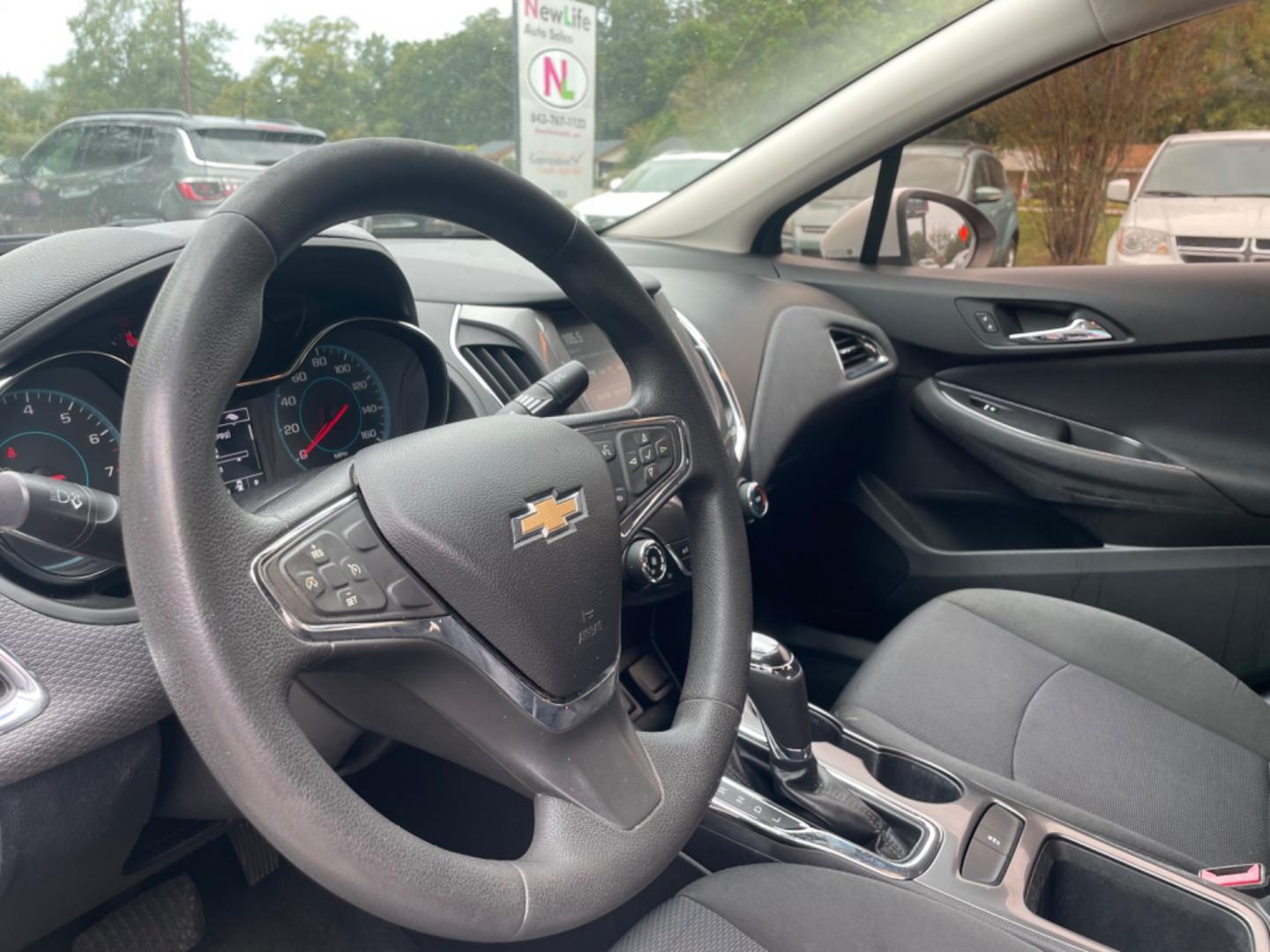 2018 WHITE CHEVROLET CRUZE LT (1G1BE5SM7J7) with an 1.4L engine, Automatic transmission, located at 5103 Dorchester Rd., Charleston, SC, 29418-5607, (843) 767-1122, 36.245171, -115.228050 - Sporty interior with Radio/AUX/USB/Sat/Bluetooth, OnStar, Power Everything (windows, locks, seat, mirrors), Heated Seats, Keyless Entry, Alloy Wheels. 118k miles Located at New Life Auto Sales! 2023 WINNER for Post & Courier's Charleston's Choice Pre-owned Car Dealer AND 2018-2024 Top 5 Finalist fo - Photo#17