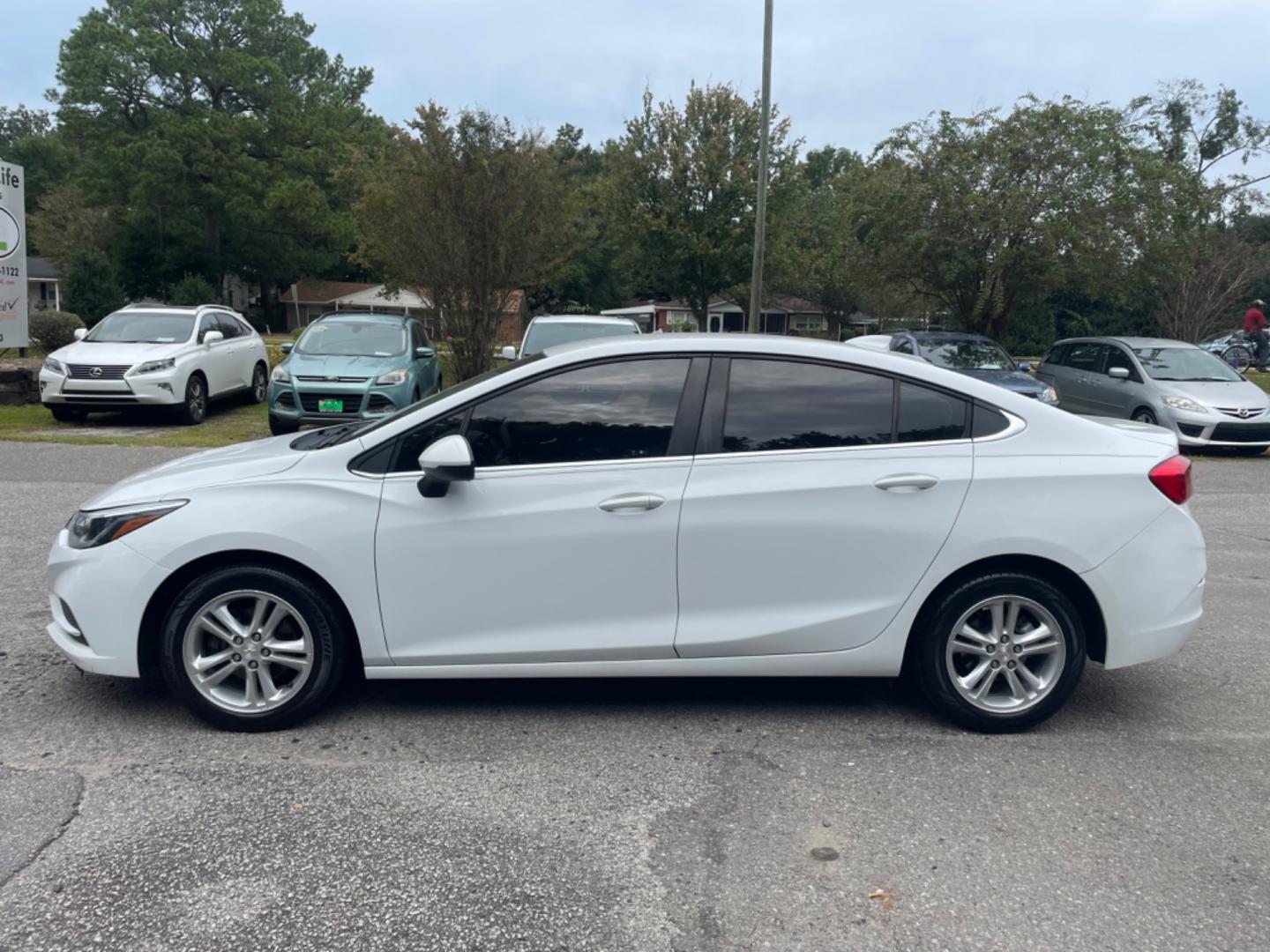 2018 WHITE CHEVROLET CRUZE LT (1G1BE5SM7J7) with an 1.4L engine, Automatic transmission, located at 5103 Dorchester Rd., Charleston, SC, 29418-5607, (843) 767-1122, 36.245171, -115.228050 - Sporty interior with Radio/AUX/USB/Sat/Bluetooth, OnStar, Power Everything (windows, locks, seat, mirrors), Heated Seats, Keyless Entry, Alloy Wheels. 118k miles Located at New Life Auto Sales! 2023 WINNER for Post & Courier's Charleston's Choice Pre-owned Car Dealer AND 2018-2024 Top 5 Finalist fo - Photo#3