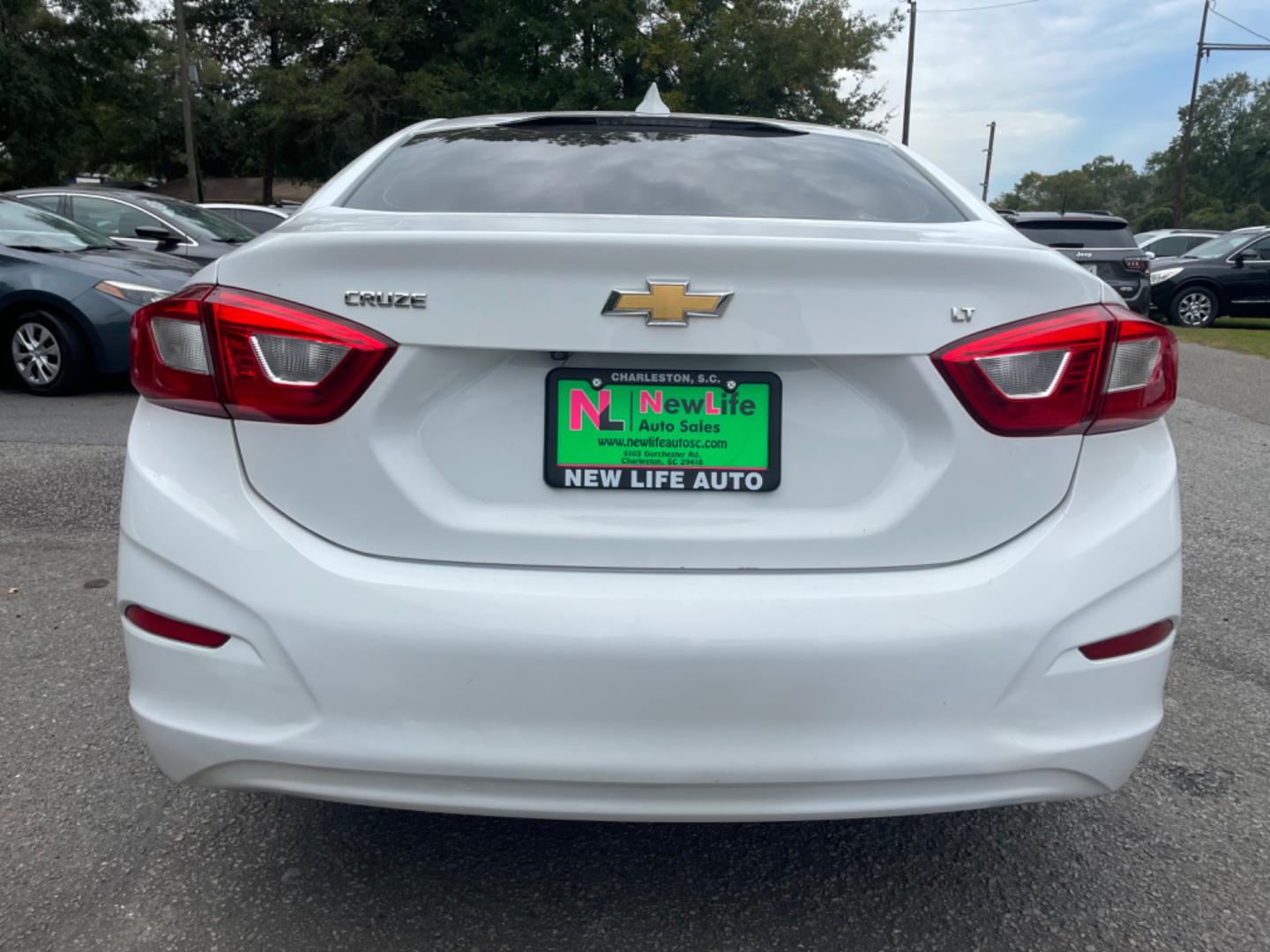 2018 WHITE CHEVROLET CRUZE LT (1G1BE5SM7J7) with an 1.4L engine, Automatic transmission, located at 5103 Dorchester Rd., Charleston, SC, 29418-5607, (843) 767-1122, 36.245171, -115.228050 - Sporty interior with Radio/AUX/USB/Sat/Bluetooth, OnStar, Power Everything (windows, locks, seat, mirrors), Heated Seats, Keyless Entry, Alloy Wheels. 118k miles Located at New Life Auto Sales! 2023 WINNER for Post & Courier's Charleston's Choice Pre-owned Car Dealer AND 2018-2024 Top 5 Finalist fo - Photo#5