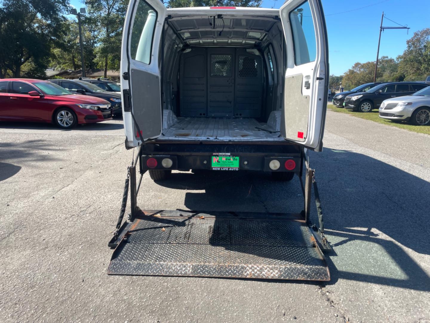 2011 WHITE FORD ECONOLINE E250 VAN (1FTNE2EW7BD) with an 4.6L engine, Automatic transmission, located at 5103 Dorchester Rd., Charleston, SC, 29418-5607, (843) 767-1122, 36.245171, -115.228050 - Spacious, AM/FM, Power Windows, Power Locks, Power Mirrors, Hydraulic Liftgate, Running Boards. Local Trade-in, Runs Great!! 190k miles Located at New Life Auto Sales! 2023 WINNER for Post & Courier's Charleston's Choice Pre-owned Car Dealer AND 2018-2024 Top 5 Finalist for Charleston City Paper's - Photo#11