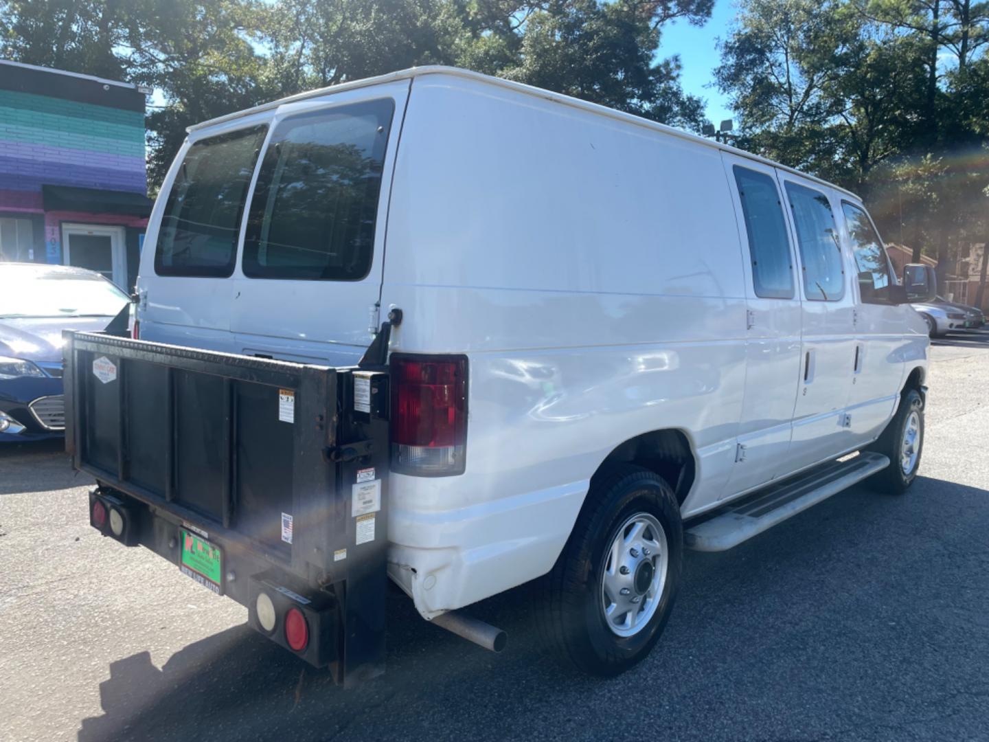 2011 WHITE FORD ECONOLINE E250 VAN (1FTNE2EW7BD) with an 4.6L engine, Automatic transmission, located at 5103 Dorchester Rd., Charleston, SC, 29418-5607, (843) 767-1122, 36.245171, -115.228050 - Spacious, AM/FM, Power Windows, Power Locks, Power Mirrors, Hydraulic Liftgate, Running Boards. Local Trade-in, Runs Great!! 190k miles Located at New Life Auto Sales! 2023 WINNER for Post & Courier's Charleston's Choice Pre-owned Car Dealer AND 2018-2024 Top 5 Finalist for Charleston City Paper's - Photo#5