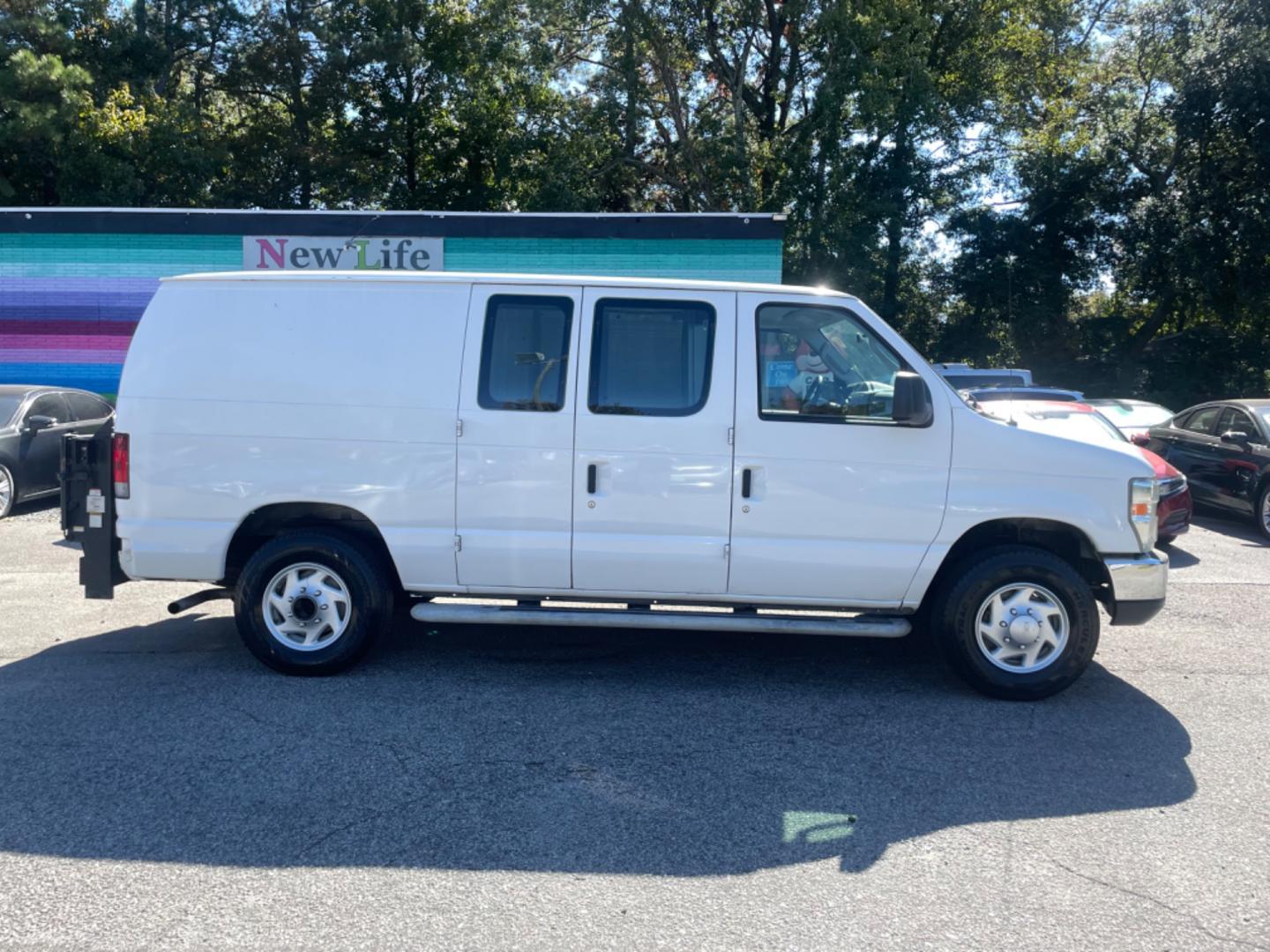 2011 WHITE FORD ECONOLINE E250 VAN (1FTNE2EW7BD) with an 4.6L engine, Automatic transmission, located at 5103 Dorchester Rd., Charleston, SC, 29418-5607, (843) 767-1122, 36.245171, -115.228050 - Spacious, AM/FM, Power Windows, Power Locks, Power Mirrors, Hydraulic Liftgate, Running Boards. Local Trade-in, Runs Great!! 190k miles Located at New Life Auto Sales! 2023 WINNER for Post & Courier's Charleston's Choice Pre-owned Car Dealer AND 2018-2024 Top 5 Finalist for Charleston City Paper's - Photo#7