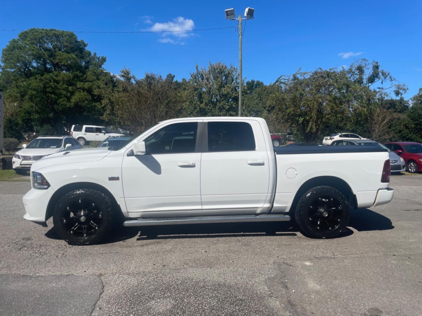 2015 WHITE RAM 1500 SPORT (1C6RR6MTXFS) with an 5.7L engine, Automatic transmission, located at 5103 Dorchester Rd., Charleston, SC, 29418-5607, (843) 767-1122, 36.245171, -115.228050 - Spacious Interior with Navigation, Backup Camera, Blutooth/AUX/Sat, Dual Climate Control, Power Everything (windows, locks, seat, mirrors) Heated Seats, Heated Steering Wheel, All-weather Mats, Push Button Start, Keyless Entry, Running Boards, Hard Bed Cover, Tow Package, Alloy Wheels. Certified One - Photo#3