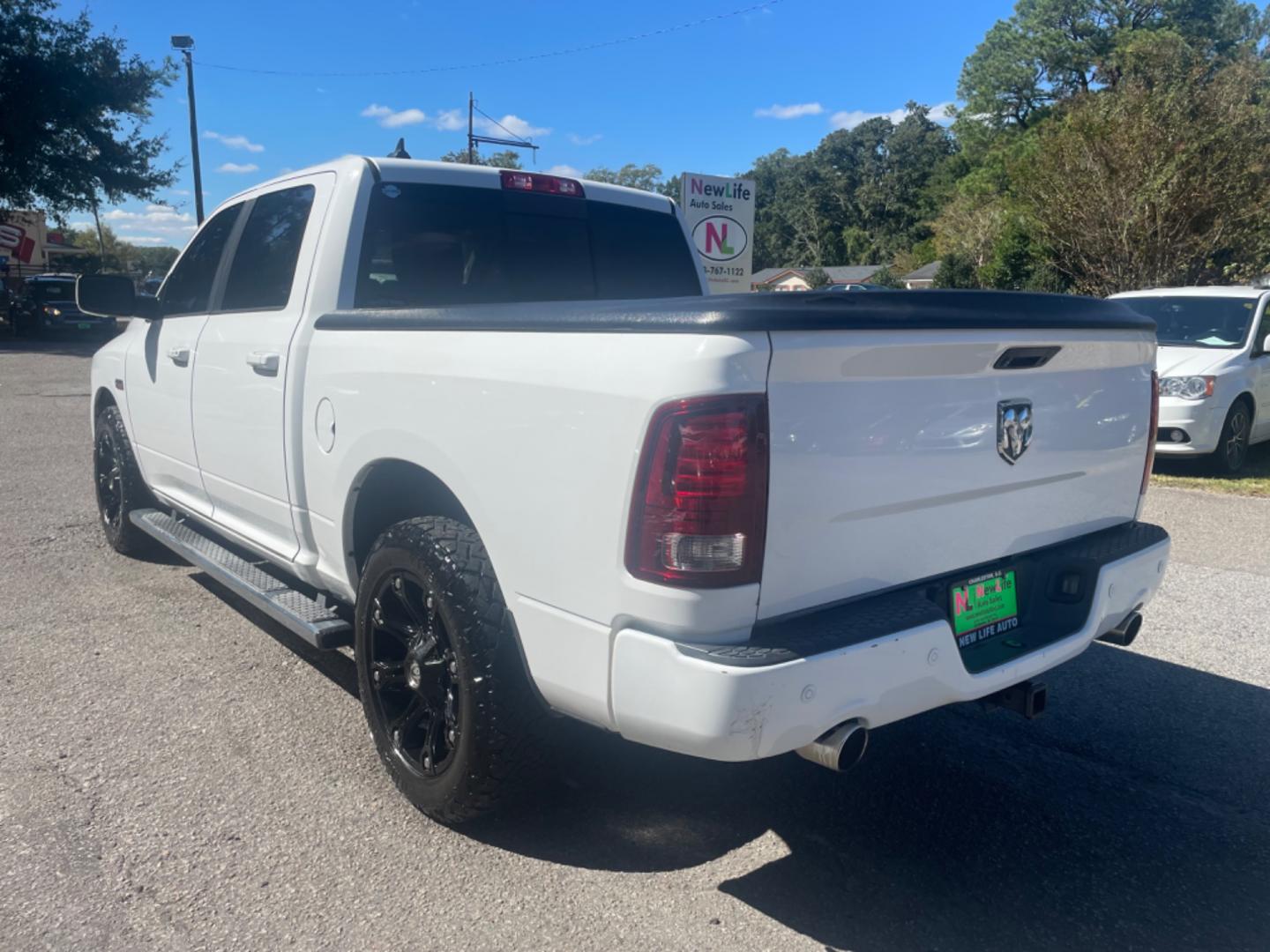 2015 WHITE RAM 1500 SPORT (1C6RR6MTXFS) with an 5.7L engine, Automatic transmission, located at 5103 Dorchester Rd., Charleston, SC, 29418-5607, (843) 767-1122, 36.245171, -115.228050 - Spacious Interior with Navigation, Backup Camera, Blutooth/AUX/Sat, Dual Climate Control, Power Everything (windows, locks, seat, mirrors) Heated Seats, Heated Steering Wheel, All-weather Mats, Push Button Start, Keyless Entry, Running Boards, Hard Bed Cover, Tow Package, Alloy Wheels. Certified One - Photo#4