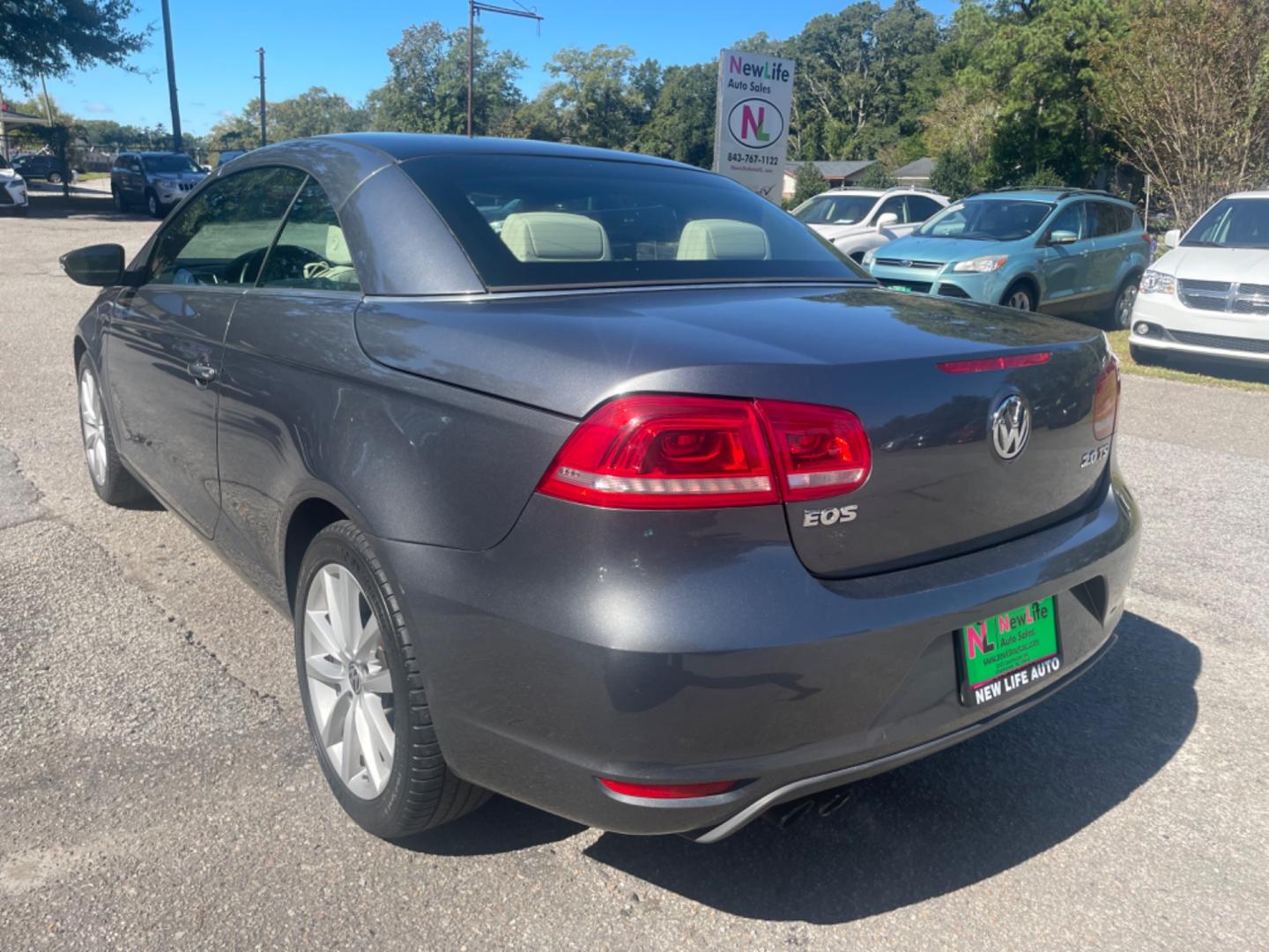 2012 GRAY VOLKSWAGEN EOS KOMFORT (WVWBW7AH9CV) with an 2.0L engine, Automatic transmission, located at 5103 Dorchester Rd., Charleston, SC, 29418-5607, (843) 767-1122, 36.245171, -115.228050 - Local Trade-in with Leather, Power Sunroof & Convertible Top, CD/AUX/Sat/Bluetooth, Dual Climate, Power Everything (windows, locks, seats, mirrors), Keyless Entry, Alloy Wheels. Clean CarFax (no accidents reported!) 110k miles Located at New Life Auto Sales! 2023 WINNER for Post & Courier's Charles - Photo#17