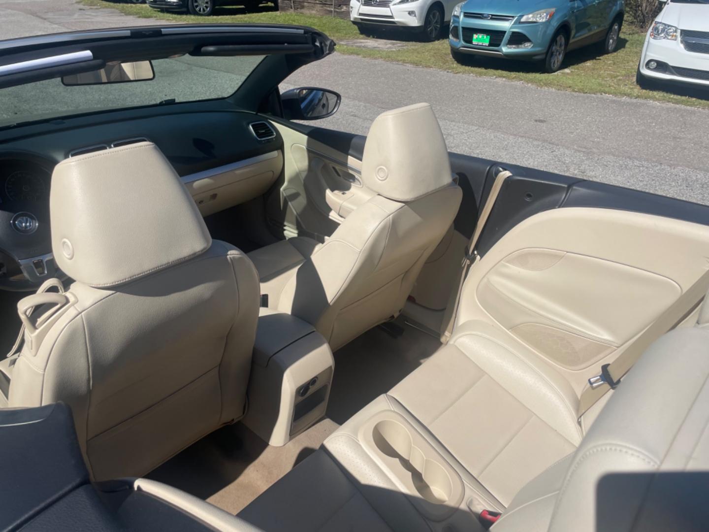 2012 GRAY VOLKSWAGEN EOS KOMFORT (WVWBW7AH9CV) with an 2.0L engine, Automatic transmission, located at 5103 Dorchester Rd., Charleston, SC, 29418-5607, (843) 767-1122, 36.245171, -115.228050 - Local Trade-in with Leather, Power Sunroof & Convertible Top, CD/AUX/Sat/Bluetooth, Dual Climate, Power Everything (windows, locks, seats, mirrors), Keyless Entry, Alloy Wheels. Clean CarFax (no accidents reported!) 110k miles Located at New Life Auto Sales! 2023 WINNER for Post & Courier's Charles - Photo#6