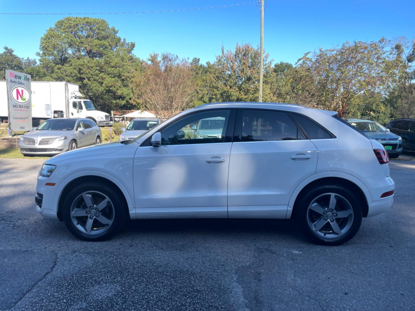 2015 WHITE AUDI Q3 PRESTIGE (WA1GFCFSXFR) with an 2.0L engine, Automatic transmission, located at 5103 Dorchester Rd., Charleston, SC, 29418-5607, (843) 767-1122, 36.245171, -115.228050 - Photo#3