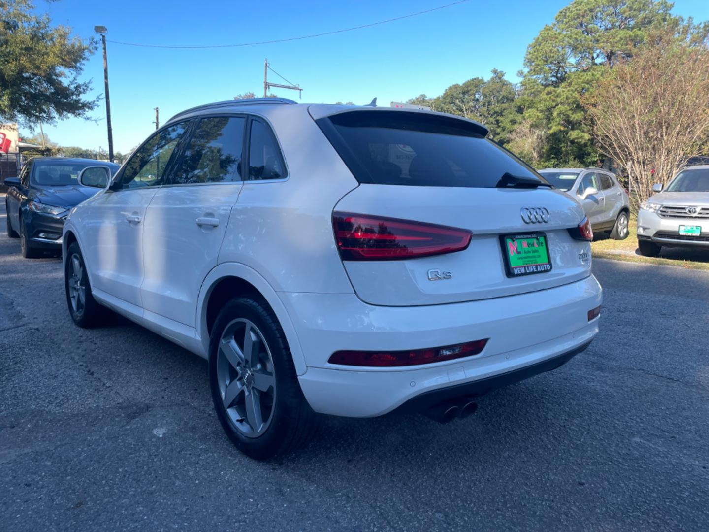 2015 WHITE AUDI Q3 PRESTIGE (WA1GFCFSXFR) with an 2.0L engine, Automatic transmission, located at 5103 Dorchester Rd., Charleston, SC, 29418-5607, (843) 767-1122, 36.245171, -115.228050 - Photo#4