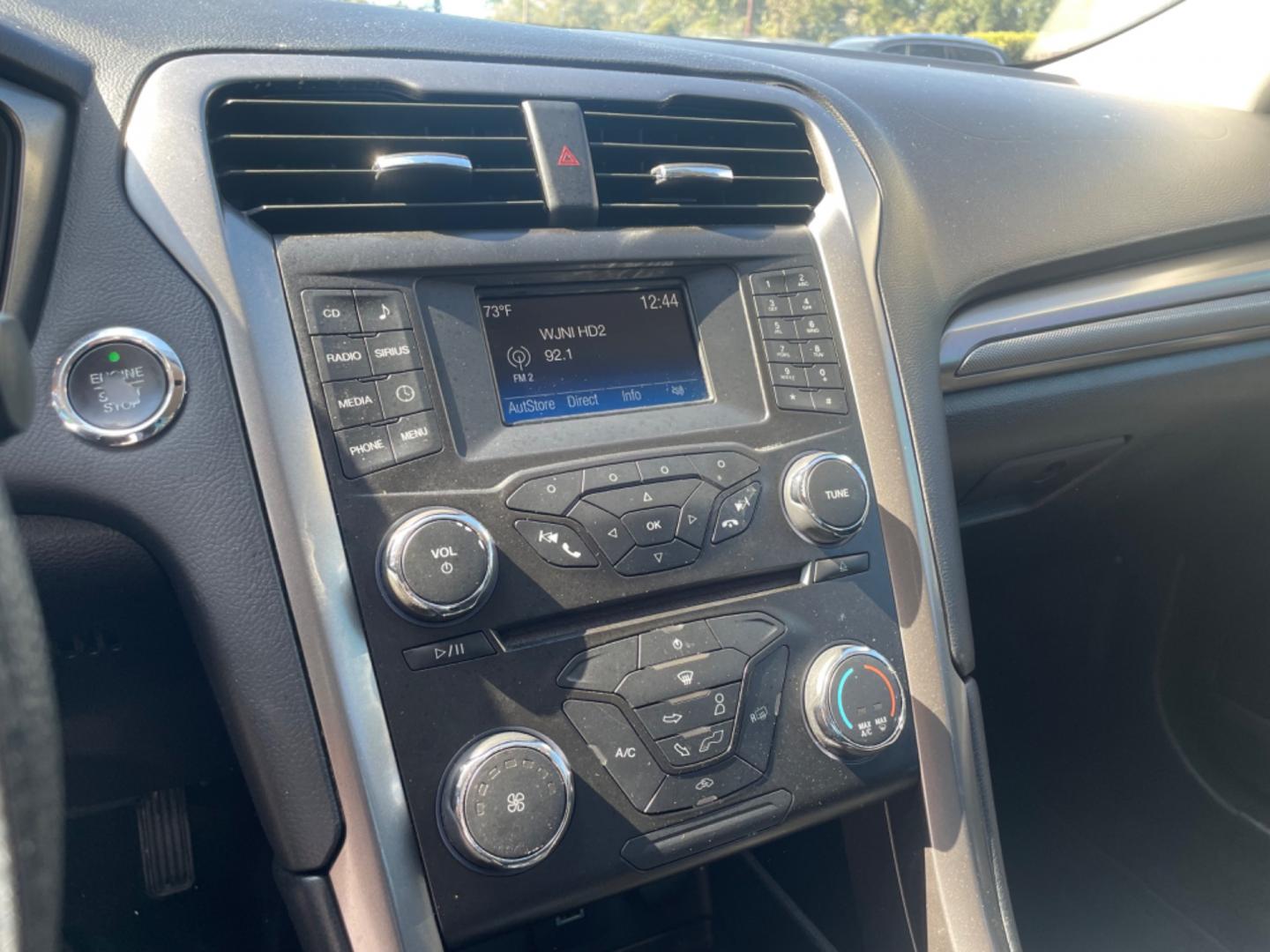 2017 BLACK FORD FUSION SE (3FA6P0H79HR) with an 2.5L engine, Automatic transmission, located at 5103 Dorchester Rd., Charleston, SC, 29418-5607, (843) 767-1122, 36.245171, -115.228050 - Comfortable interior with CD/AUX/Sat/Bluetooth, Backup Camera, Power Everything (windows, locks, seats, mirrors), Push Button Start, Keyless Entry, Alloy Wheels. Clean CarFax (no accidents reported!) Local Trade-in!! Only 92k miles Located at New Life Auto Sales! 2023 WINNER for Post & Courier's C - Photo#15