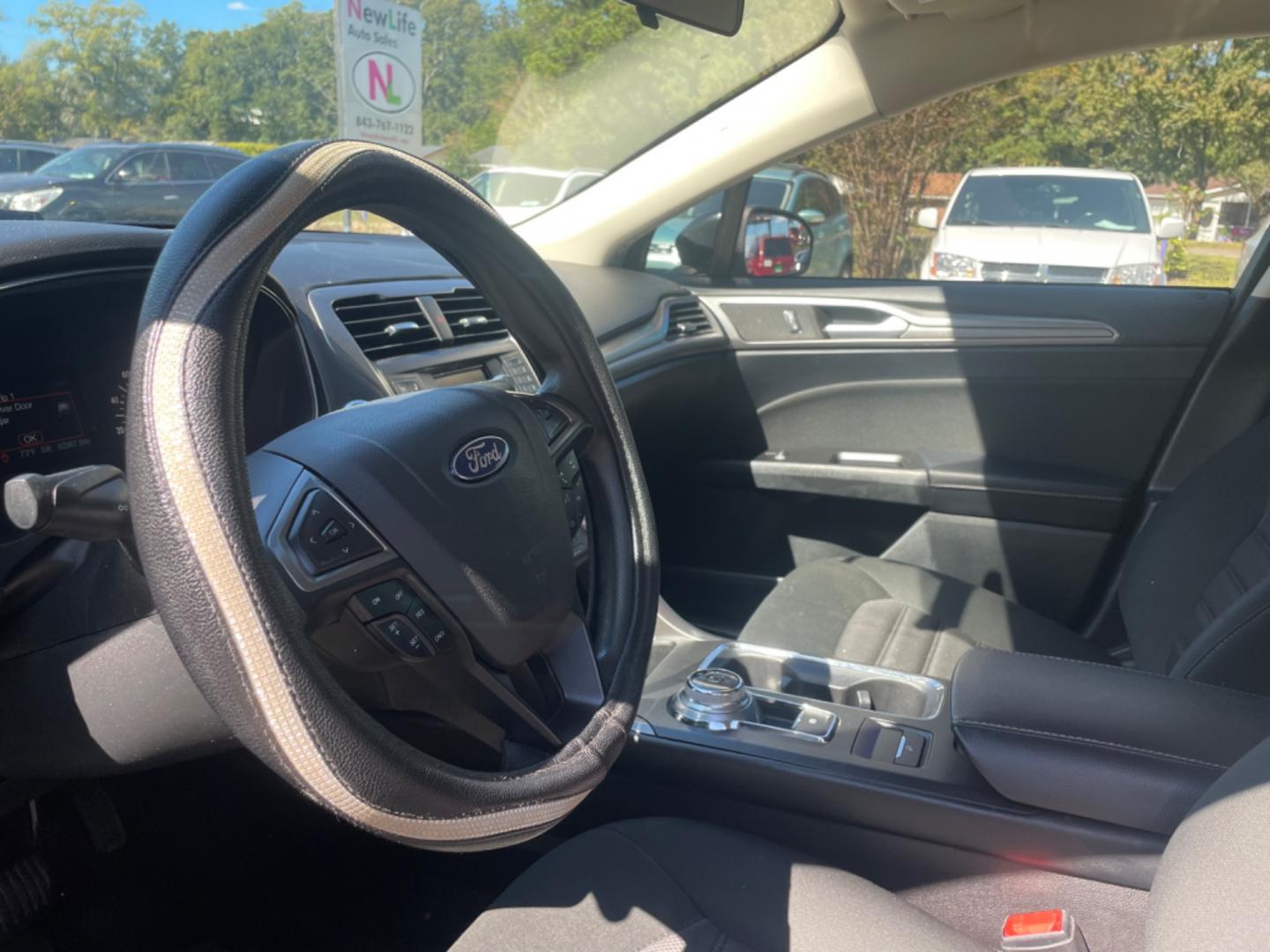 2017 BLACK FORD FUSION SE (3FA6P0H79HR) with an 2.5L engine, Automatic transmission, located at 5103 Dorchester Rd., Charleston, SC, 29418-5607, (843) 767-1122, 36.245171, -115.228050 - Comfortable interior with CD/AUX/Sat/Bluetooth, Backup Camera, Power Everything (windows, locks, seats, mirrors), Push Button Start, Keyless Entry, Alloy Wheels. Clean CarFax (no accidents reported!) Local Trade-in!! Only 92k miles Located at New Life Auto Sales! 2023 WINNER for Post & Courier's C - Photo#18