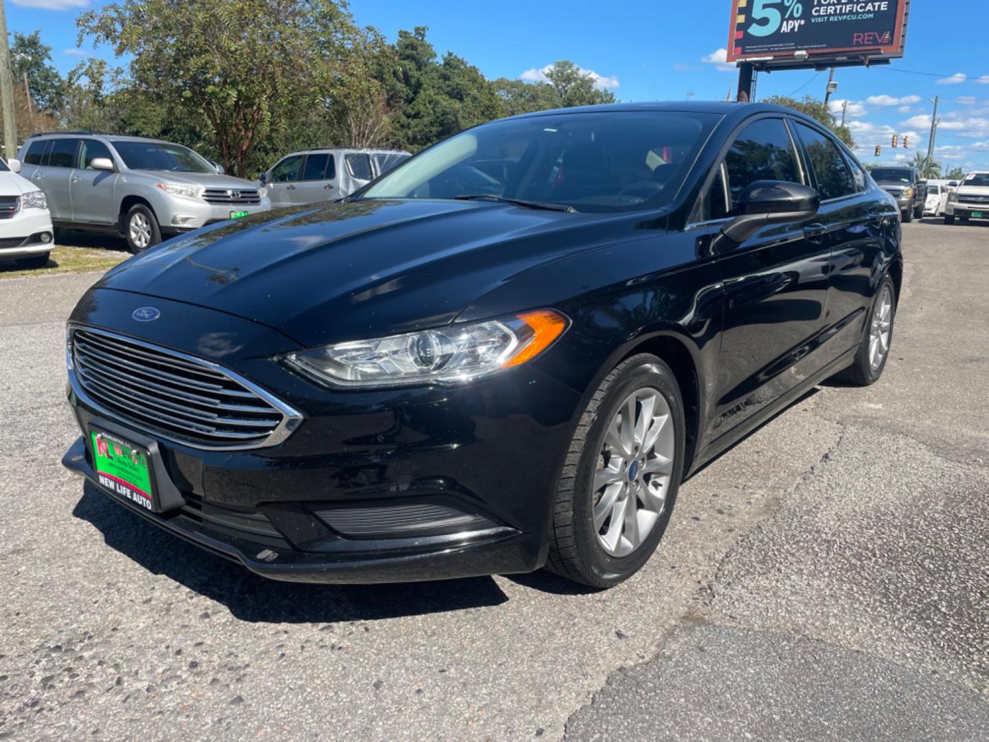 2017 BLACK FORD FUSION SE (3FA6P0H79HR) with an 2.5L engine, Automatic transmission, located at 5103 Dorchester Rd., Charleston, SC, 29418-5607, (843) 767-1122, 36.245171, -115.228050 - Comfortable interior with CD/AUX/Sat/Bluetooth, Backup Camera, Power Everything (windows, locks, seats, mirrors), Push Button Start, Keyless Entry, Alloy Wheels. Clean CarFax (no accidents reported!) Local Trade-in!! Only 92k miles Located at New Life Auto Sales! 2023 WINNER for Post & Courier's C - Photo#2