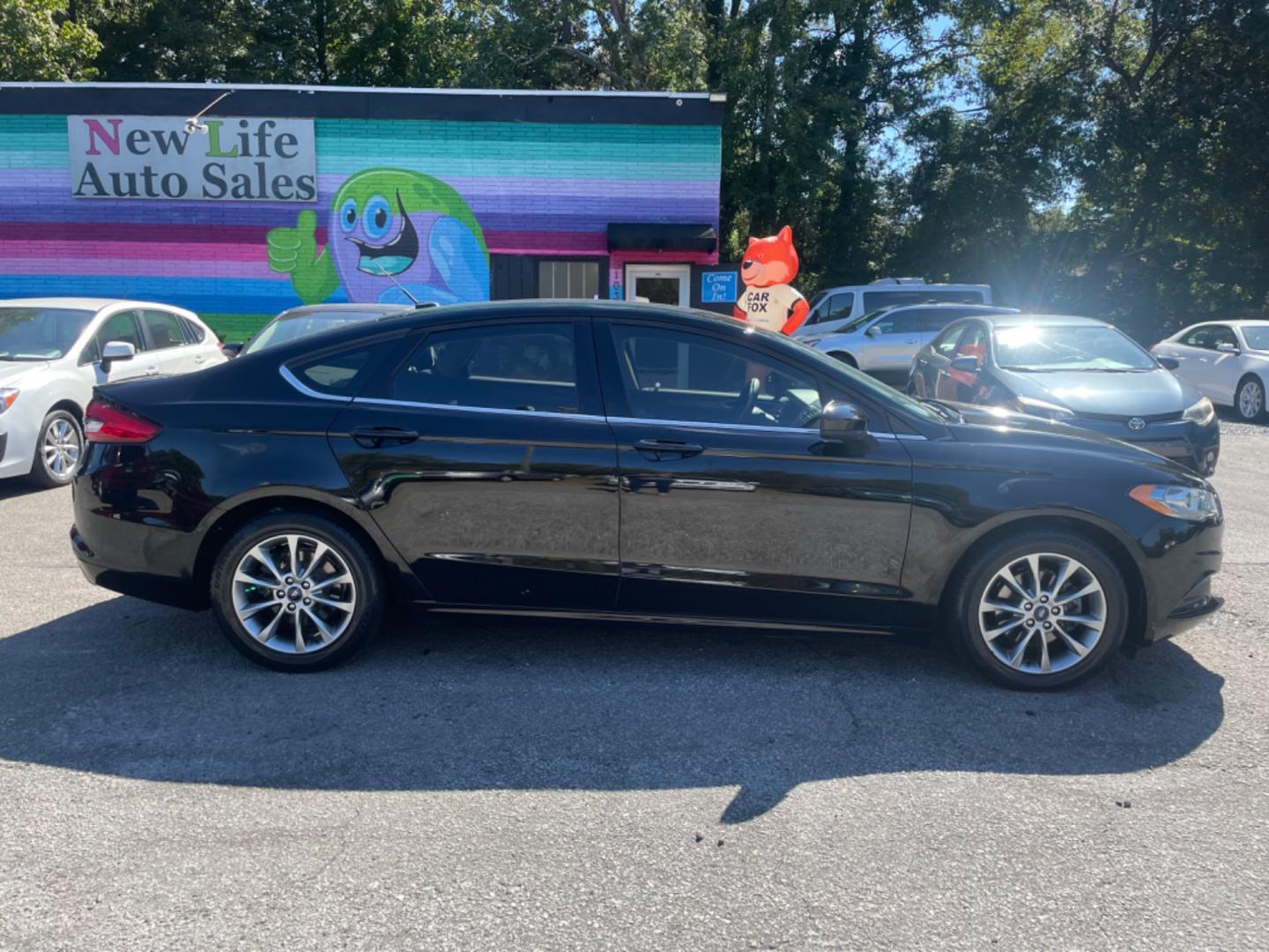 2017 BLACK FORD FUSION SE (3FA6P0H79HR) with an 2.5L engine, Automatic transmission, located at 5103 Dorchester Rd., Charleston, SC, 29418-5607, (843) 767-1122, 36.245171, -115.228050 - Comfortable interior with CD/AUX/Sat/Bluetooth, Backup Camera, Power Everything (windows, locks, seats, mirrors), Push Button Start, Keyless Entry, Alloy Wheels. Clean CarFax (no accidents reported!) Local Trade-in!! Only 92k miles Located at New Life Auto Sales! 2023 WINNER for Post & Courier's C - Photo#7