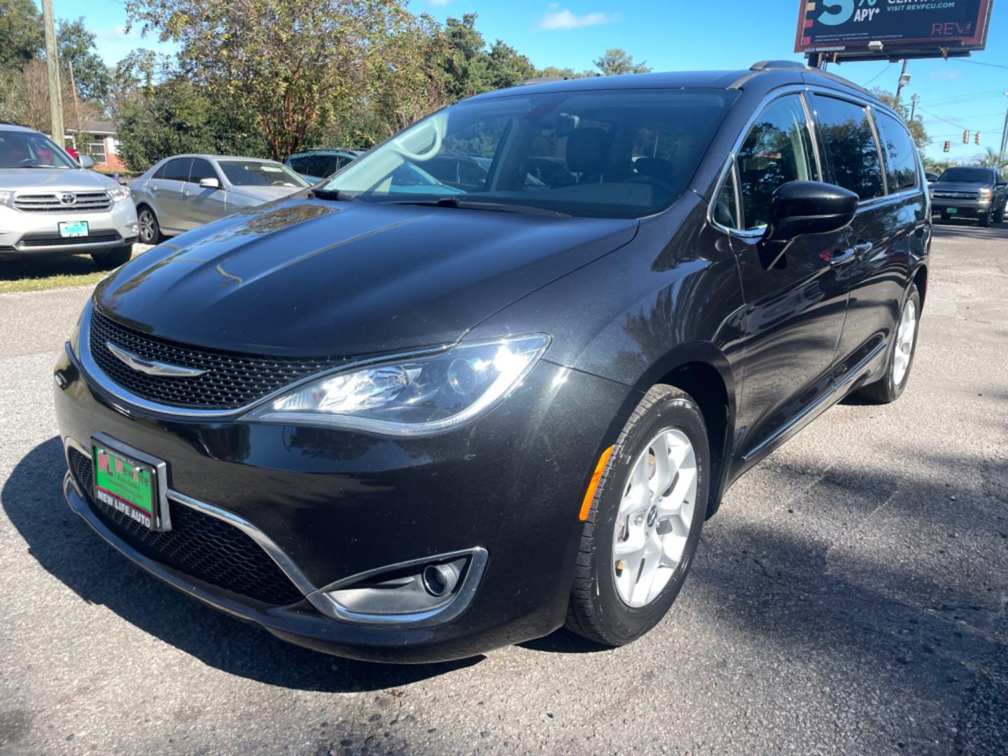 2017 BLACK CHRYSLER PACIFICA TOURING L (2C4RC1BG5HR) with an 3.6L engine, Automatic transmission, located at 5103 Dorchester Rd., Charleston, SC, 29418-5607, (843) 767-1122, 36.245171, -115.228050 - Photo#2