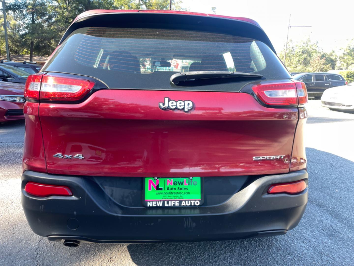 2014 RED JEEP CHEROKEE SPORT (1C4PJMAB6EW) with an 2.4L engine, Automatic transmission, located at 5103 Dorchester Rd., Charleston, SC, 29418-5607, (843) 767-1122, 36.245171, -115.228050 - Photo#5