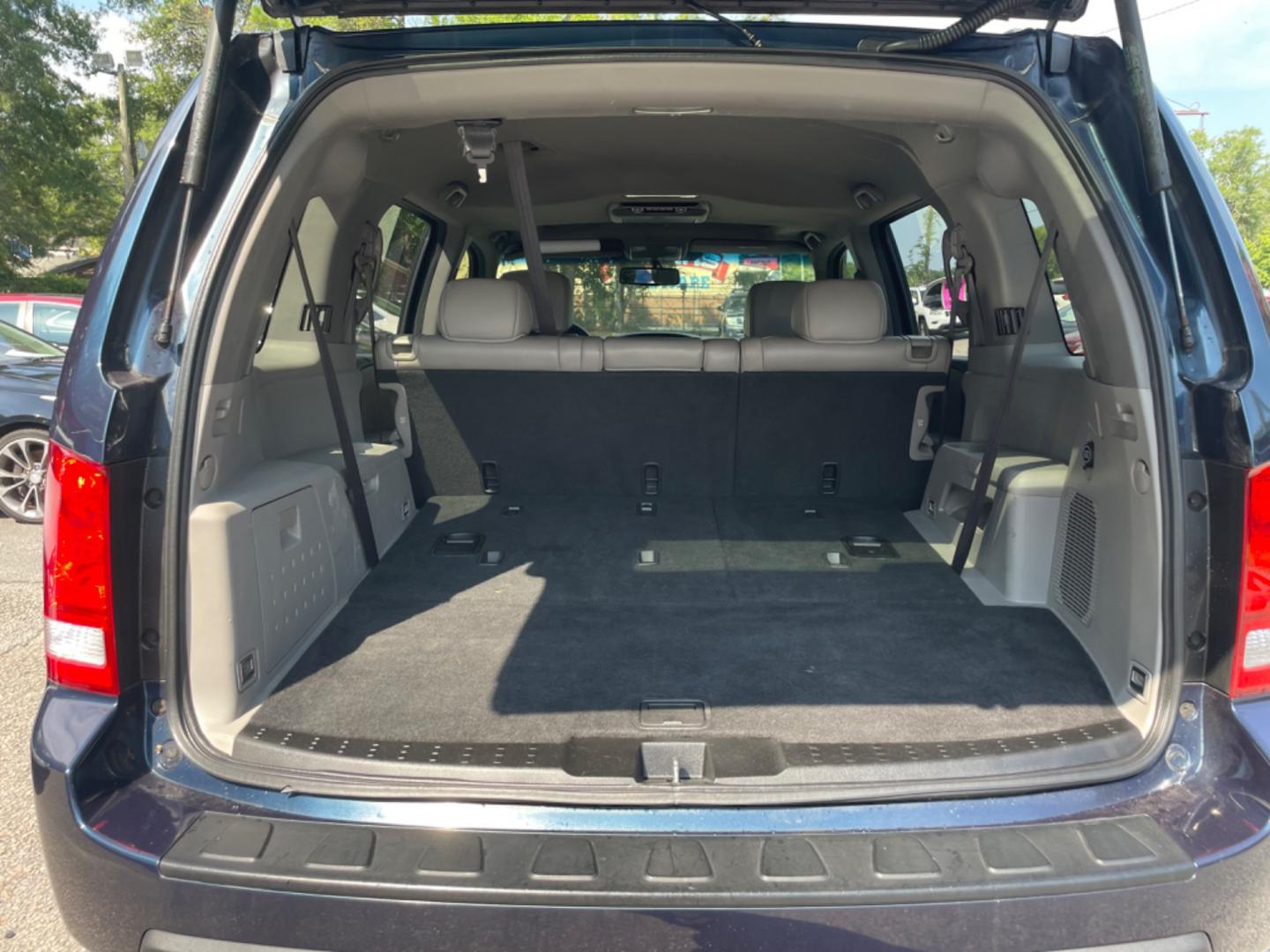 2011 BLUE HONDA PILOT EX-L W/DVD (5FNYF3H66BB) with an 3.5L engine, Automatic transmission, located at 5103 Dorchester Rd., Charleston, SC, 29418-5607, (843) 767-1122, 36.245171, -115.228050 - Local Trade-in with Leather, Sunroof, Backup Camera, 6-disc CD/Sat/AUX, Dual Climate Control, Power Everything (windows, locks, seats, mirrors), Heated Seats, Rear DVD, Rear Climate, Keyless Entry, Alloy Wheels. Clean CarFax (no accidents reported!) 130k miles Located at New Life Auto Sales! 2023 W - Photo#15