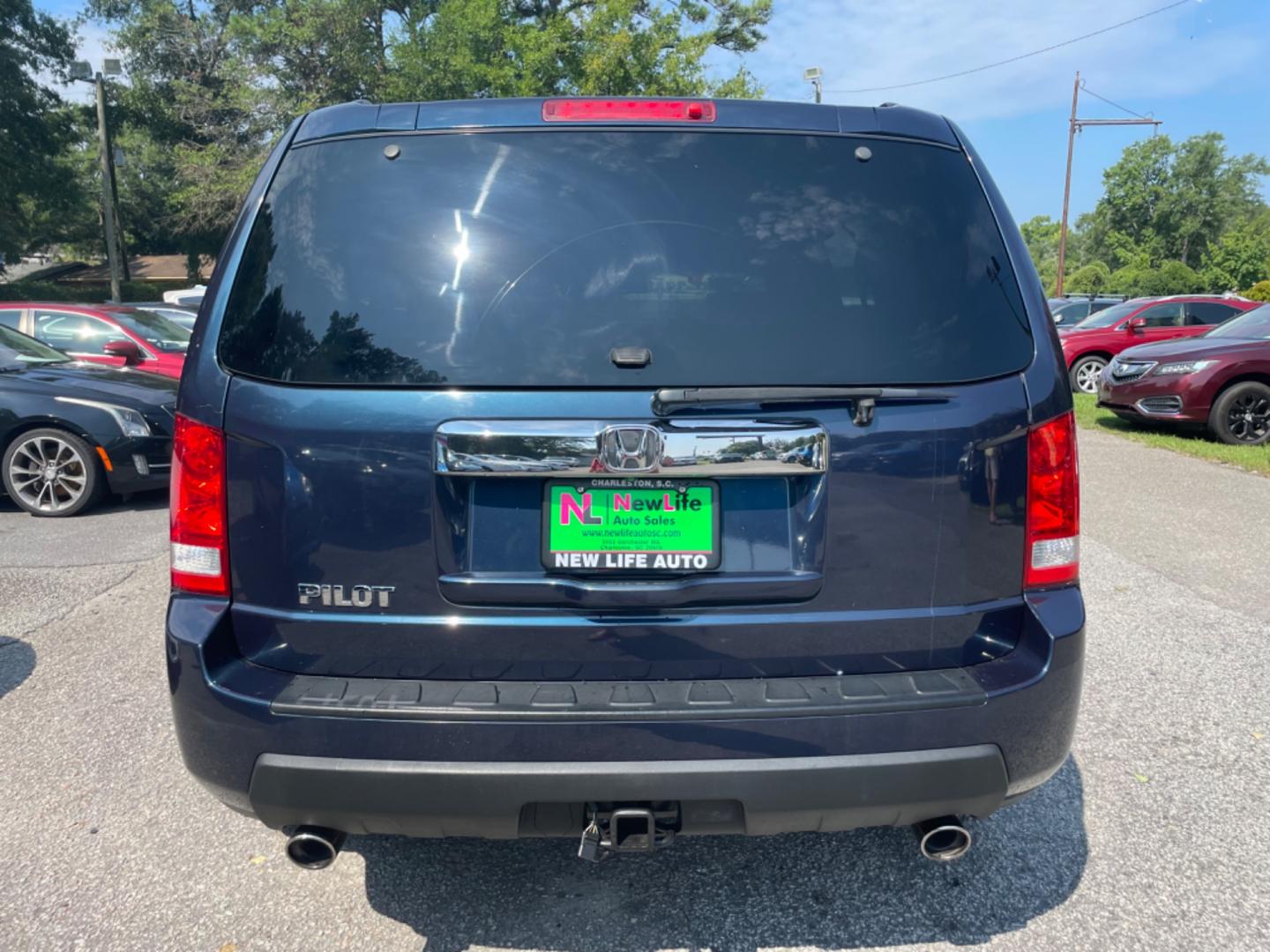 2011 BLUE HONDA PILOT EX-L W/DVD (5FNYF3H66BB) with an 3.5L engine, Automatic transmission, located at 5103 Dorchester Rd., Charleston, SC, 29418-5607, (843) 767-1122, 36.245171, -115.228050 - Local Trade-in with Leather, Sunroof, Backup Camera, 6-disc CD/Sat/AUX, Dual Climate Control, Power Everything (windows, locks, seats, mirrors), Heated Seats, Rear DVD, Rear Climate, Keyless Entry, Alloy Wheels. Clean CarFax (no accidents reported!) 130k miles Located at New Life Auto Sales! 2023 W - Photo#5