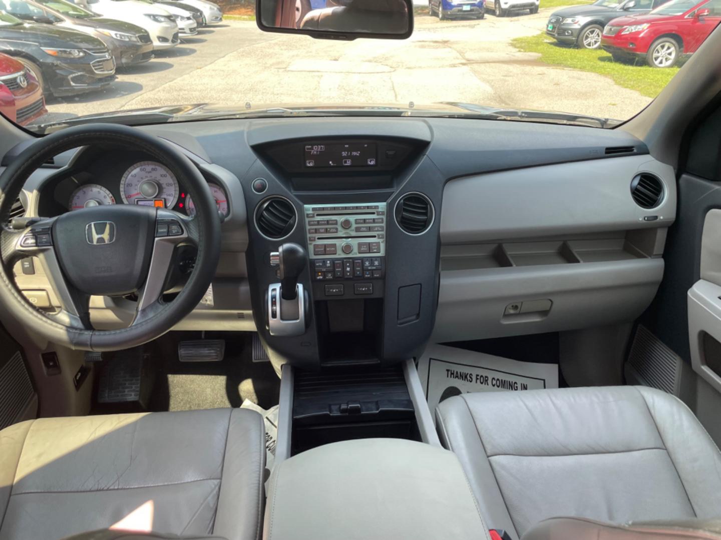 2011 BLUE HONDA PILOT EX-L W/DVD (5FNYF3H66BB) with an 3.5L engine, Automatic transmission, located at 5103 Dorchester Rd., Charleston, SC, 29418-5607, (843) 767-1122, 36.245171, -115.228050 - Photo#19